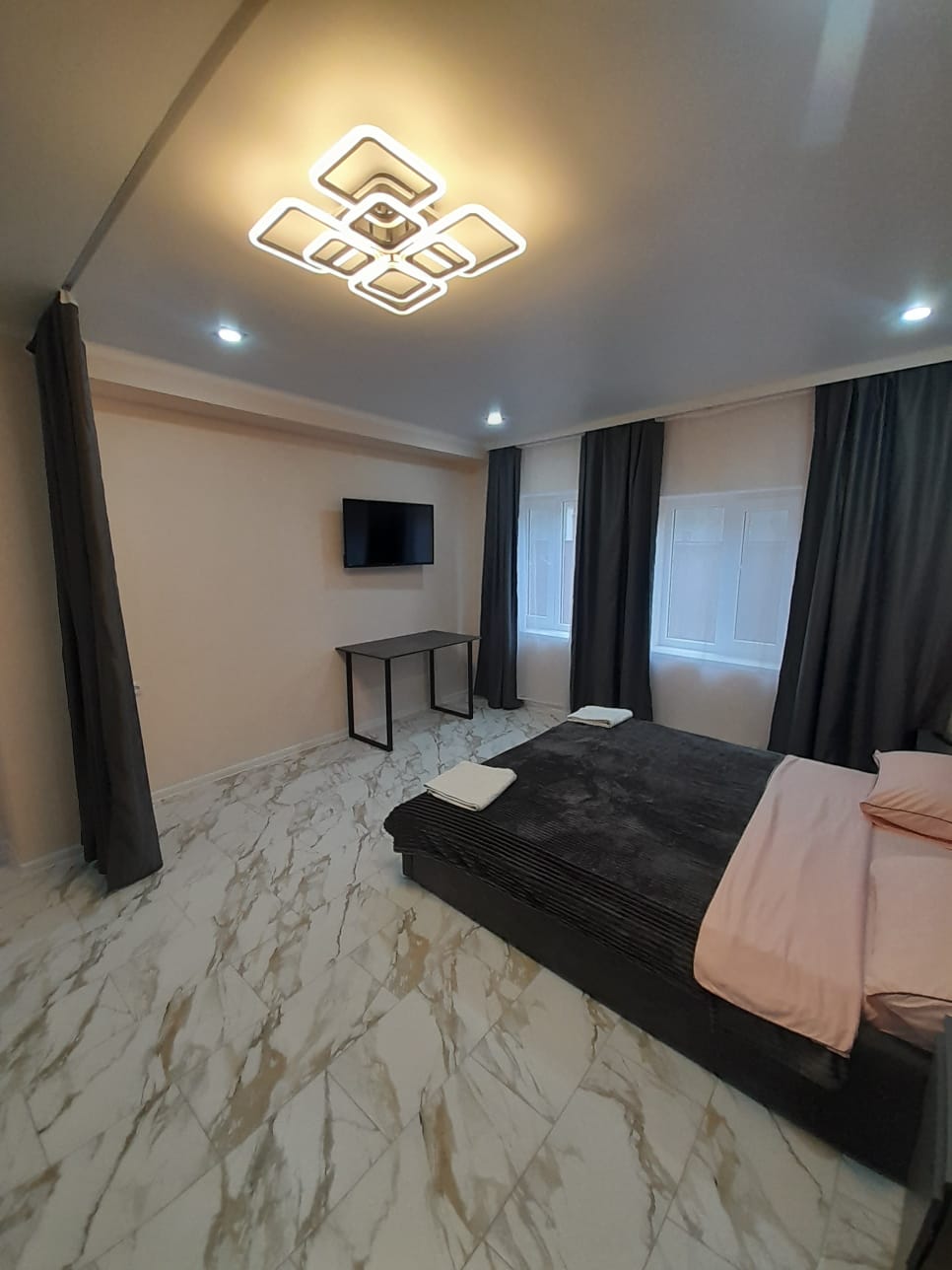 Улучшенный четырехместный номер