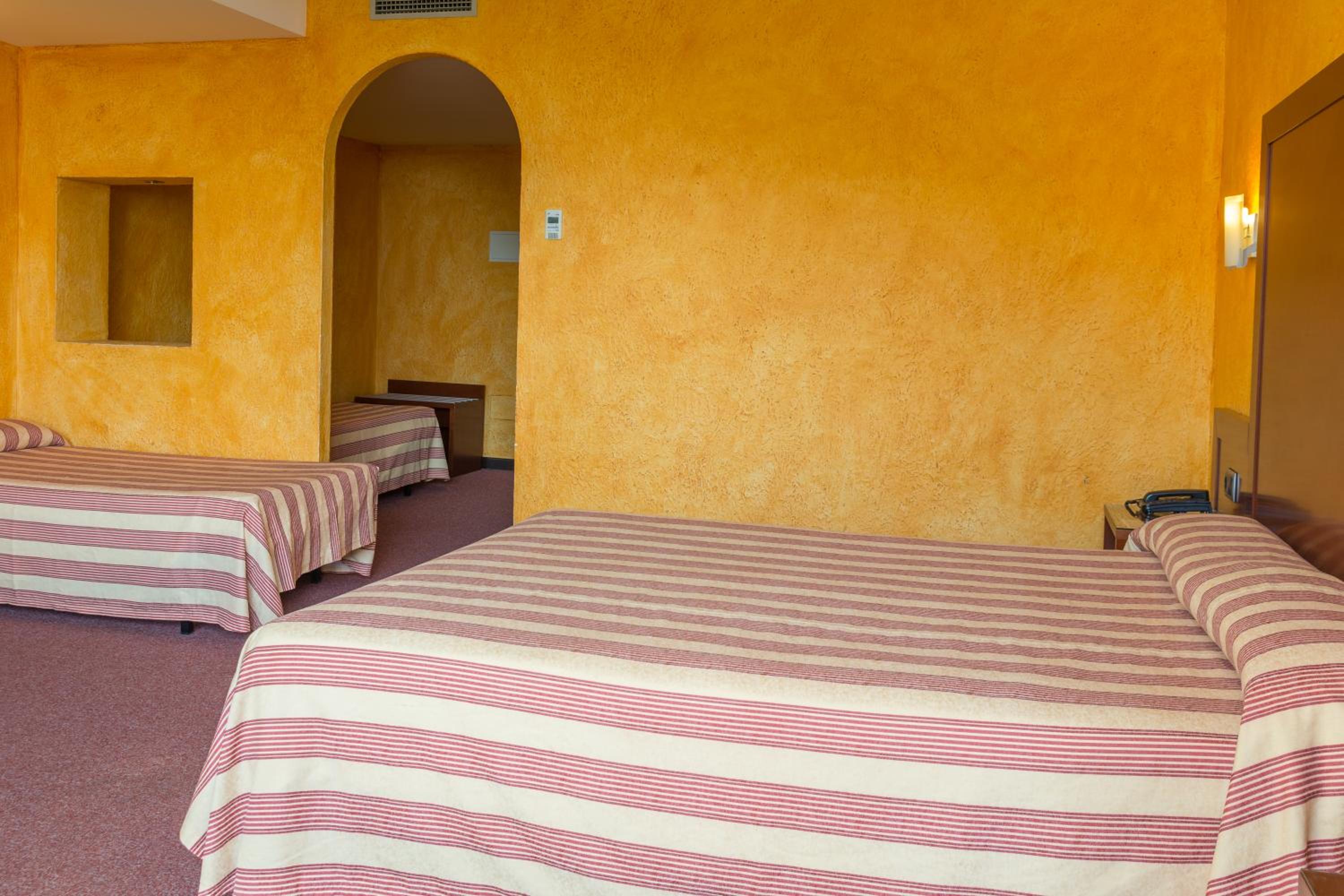 Quadruple Room (2 Adults + 2 Children)