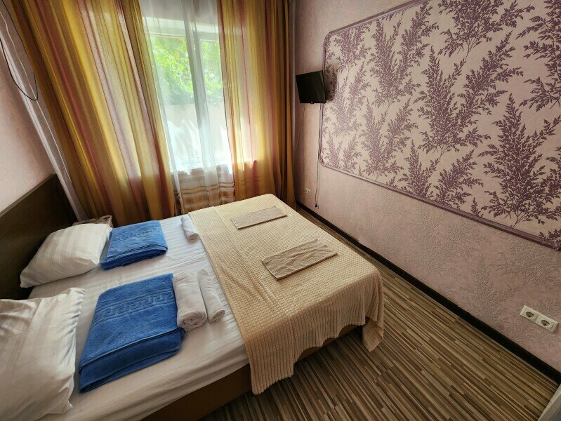 Улучшенный четырехместный номер