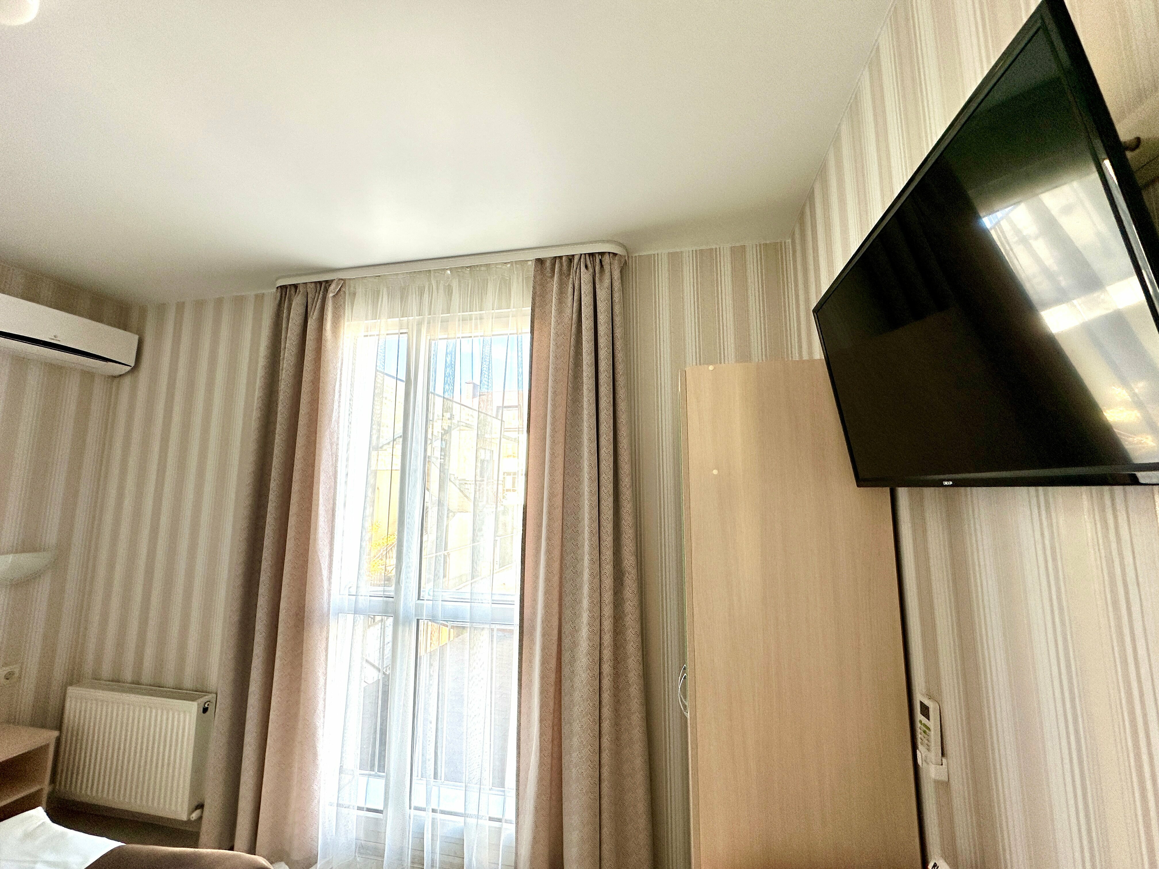 Стандартный двухместный номер с 1 кроватью или 2 отдельными кроватями, вид на сад