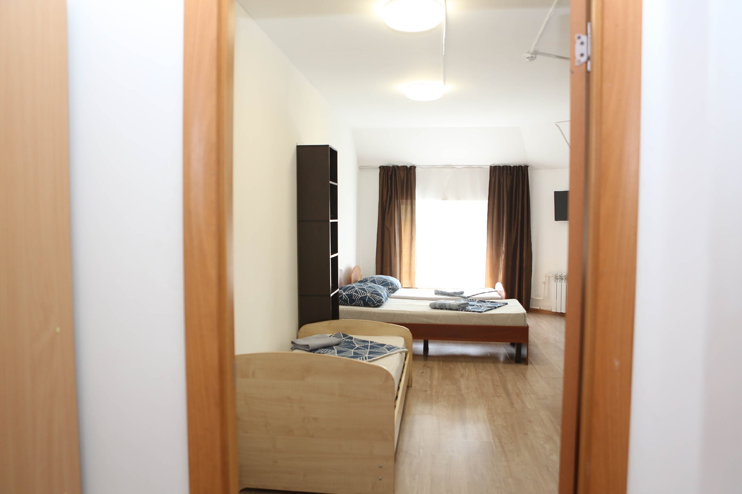 Четырехместный номер с ванной комнатой