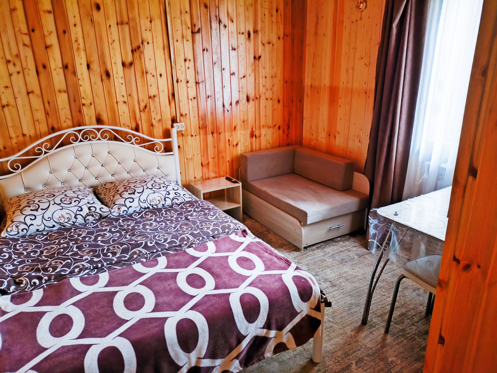 Трехместный номер Делюкс