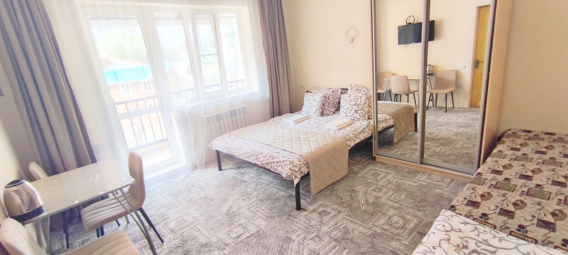 Четырехместный номер с балконом