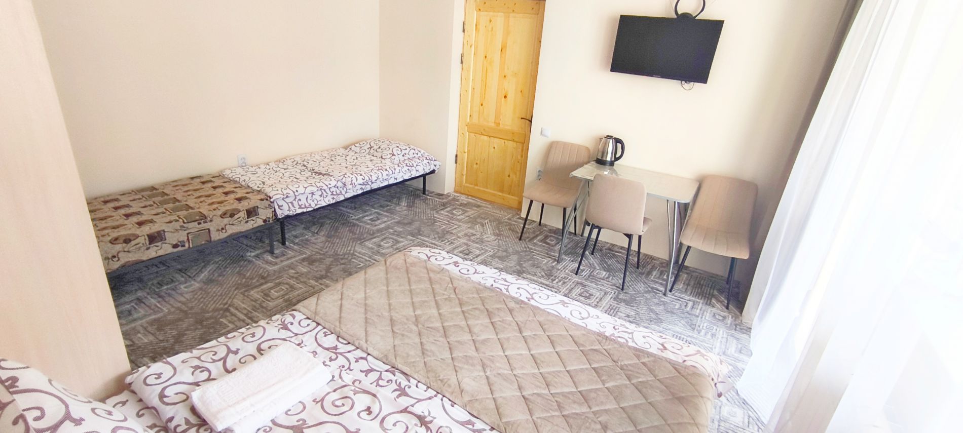 Четырехместный номер с балконом