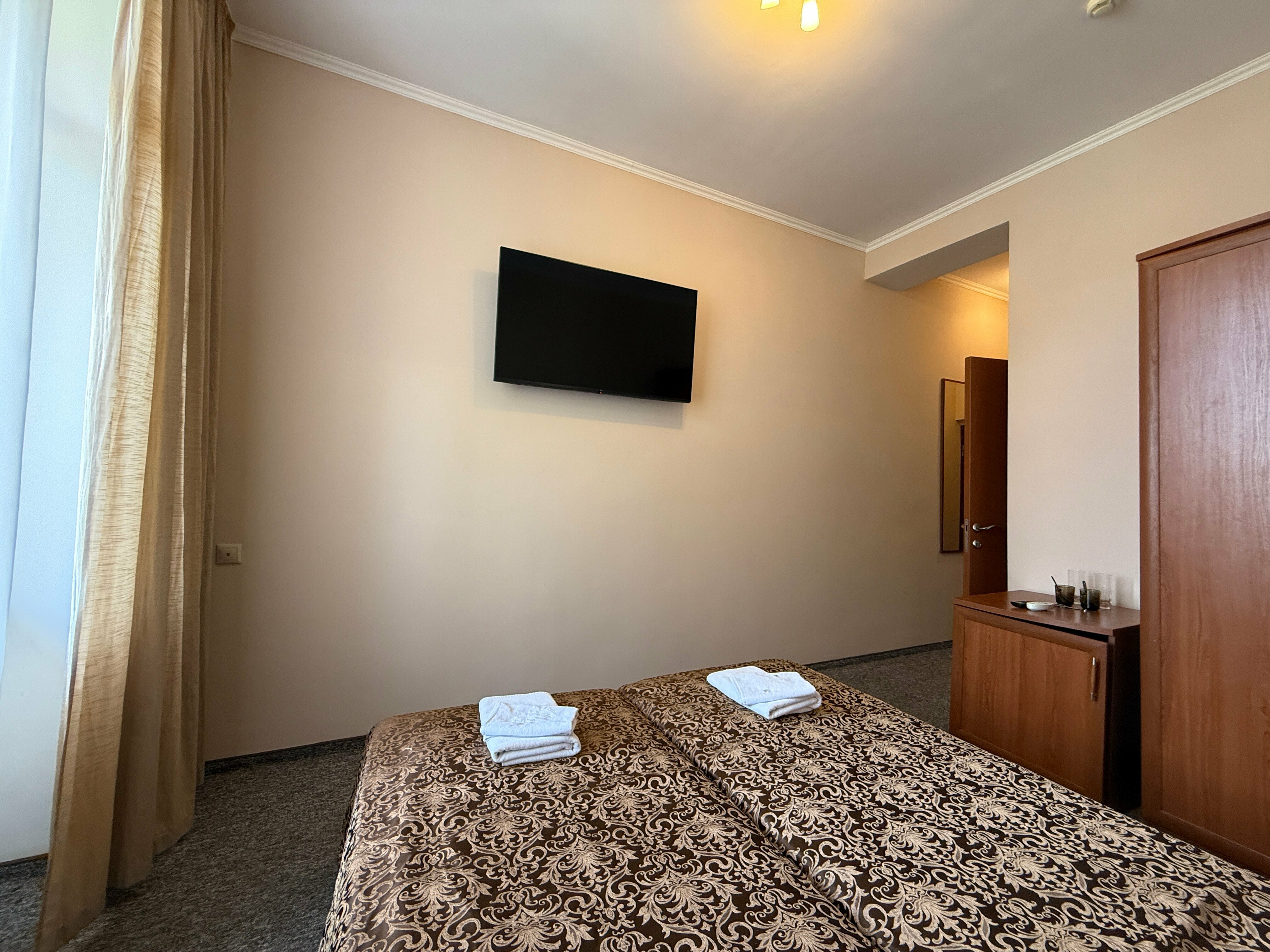 Двухместный номер с 2 отдельными кроватями и балконом