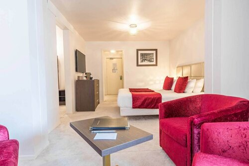 Chambre familiale Prestige (2 adultes et 4 enfants в Madame Vacances Hotel Le Mottaret