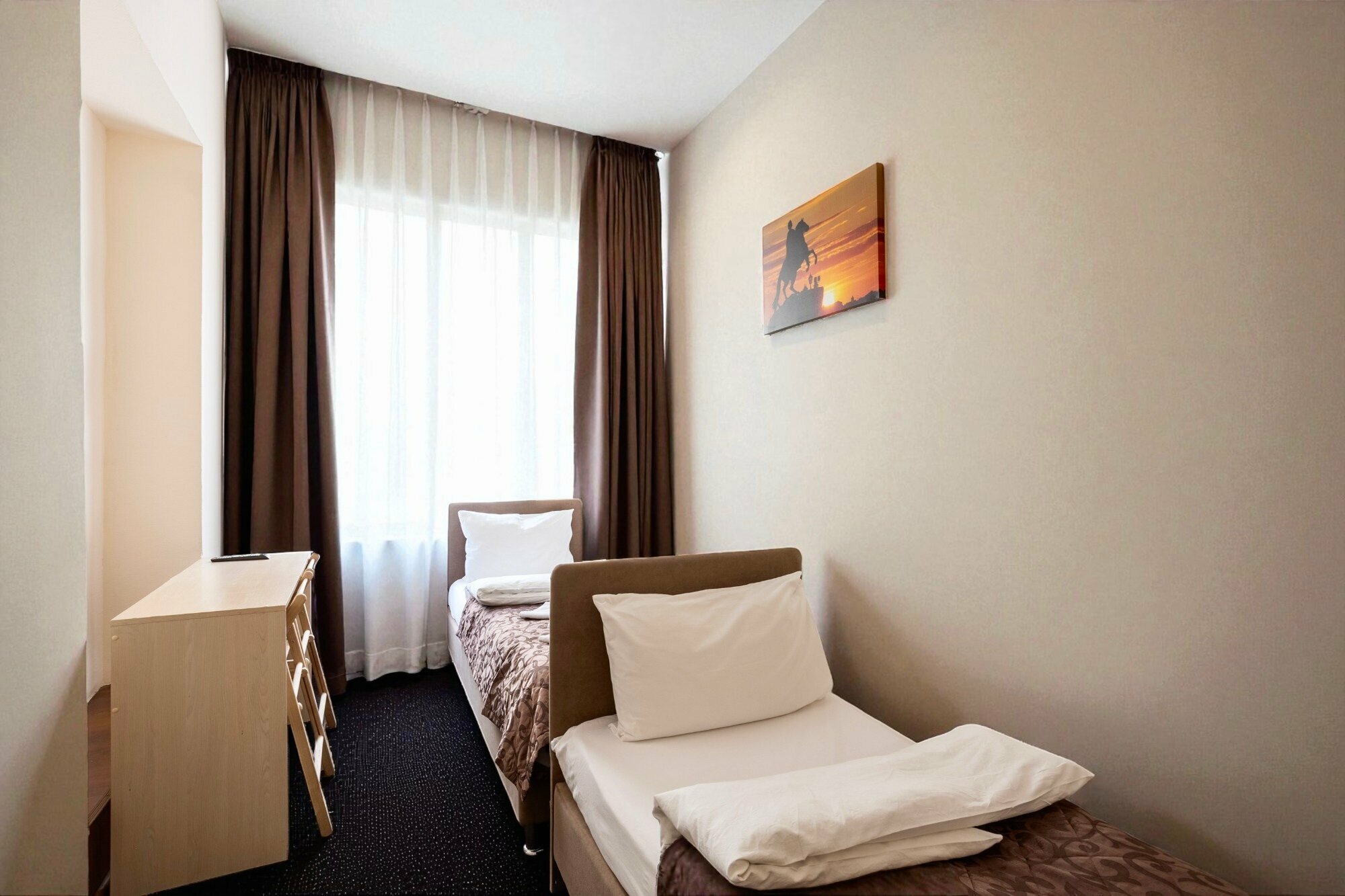 Двухместный номер эконом-класса с 2 отдельными кроватями