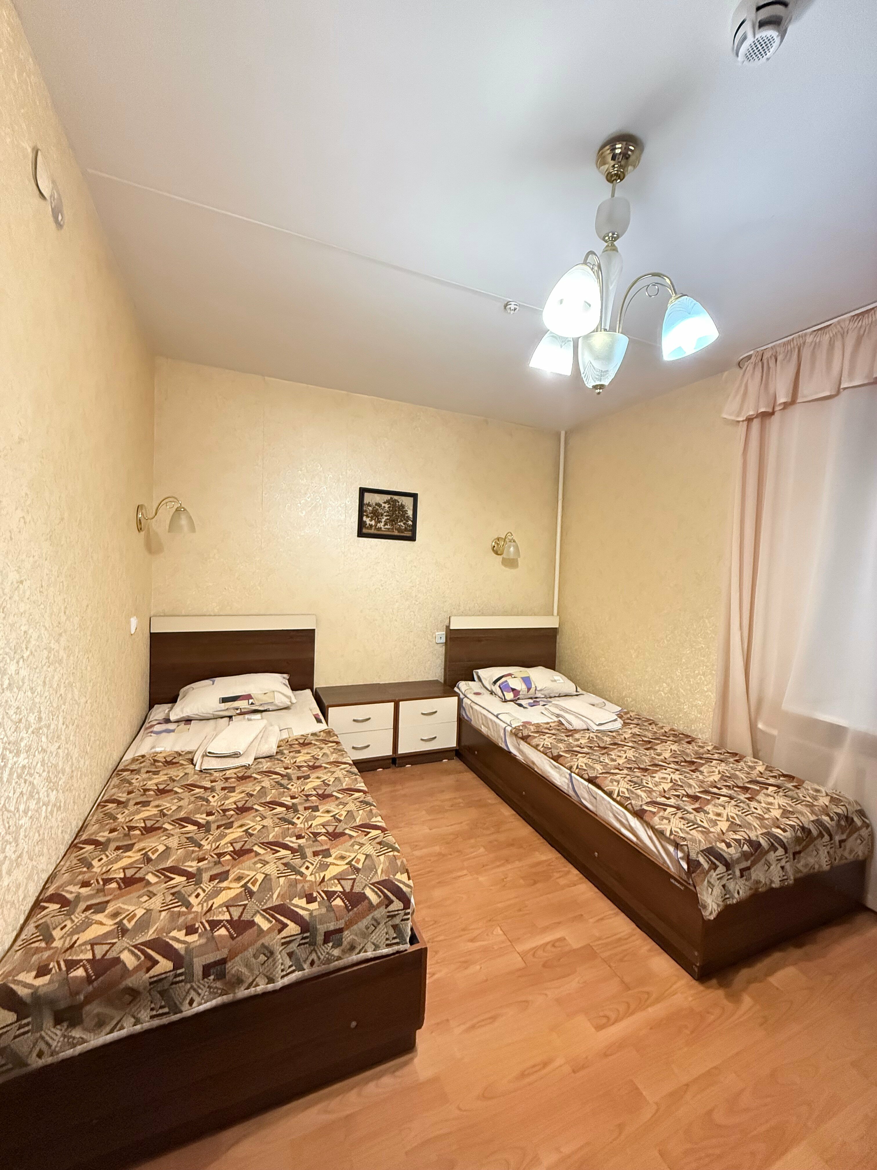 Просторный двухместный номер с 2 отдельными кроватями