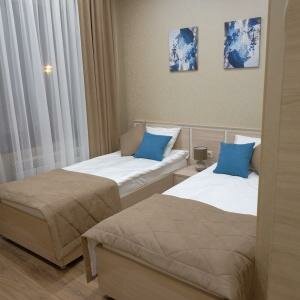 Двухместный с 2 отдельными кроватями