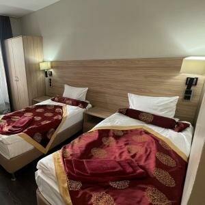 Номер без балкона (1 двуспальная или 2 раздельные кровати) 202-207,302-304,307,309,408,703