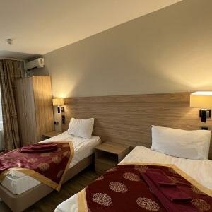 Номер без балкона (1 двуспальная или 2 раздельные кровати) 202-207,302-304,307,309,408,703