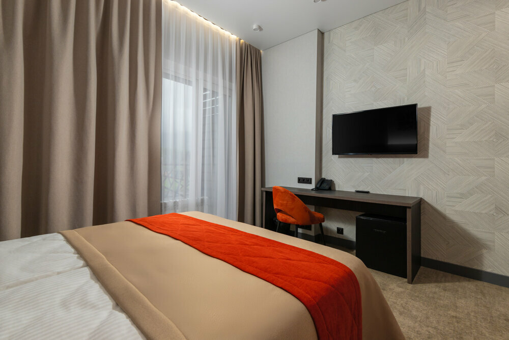 Стандартный  двухместный номер с 1 кроватью или 2 отдельными кроватями и балконом с видом на горы