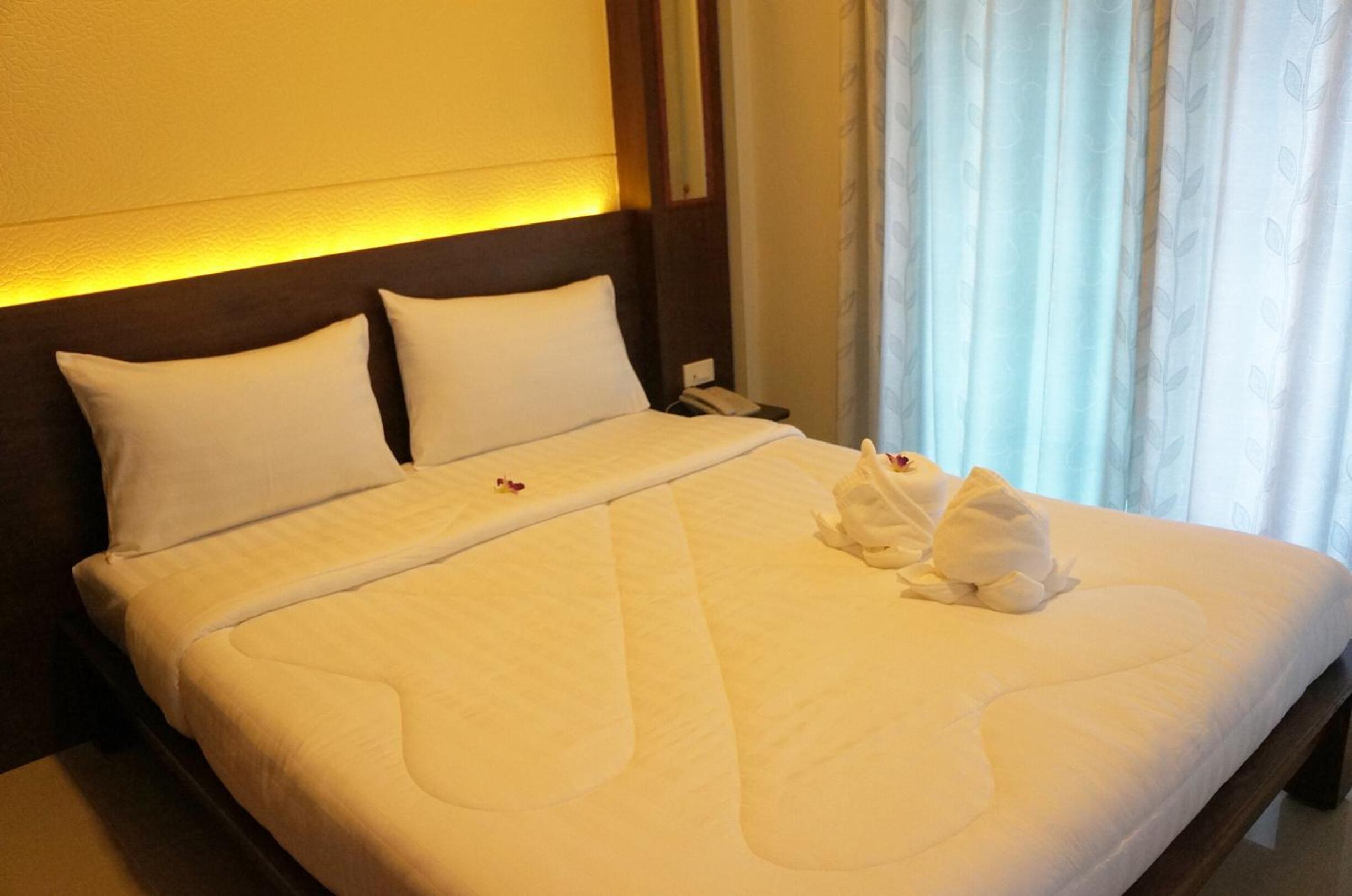 Quadruple Room with Private Bathroom