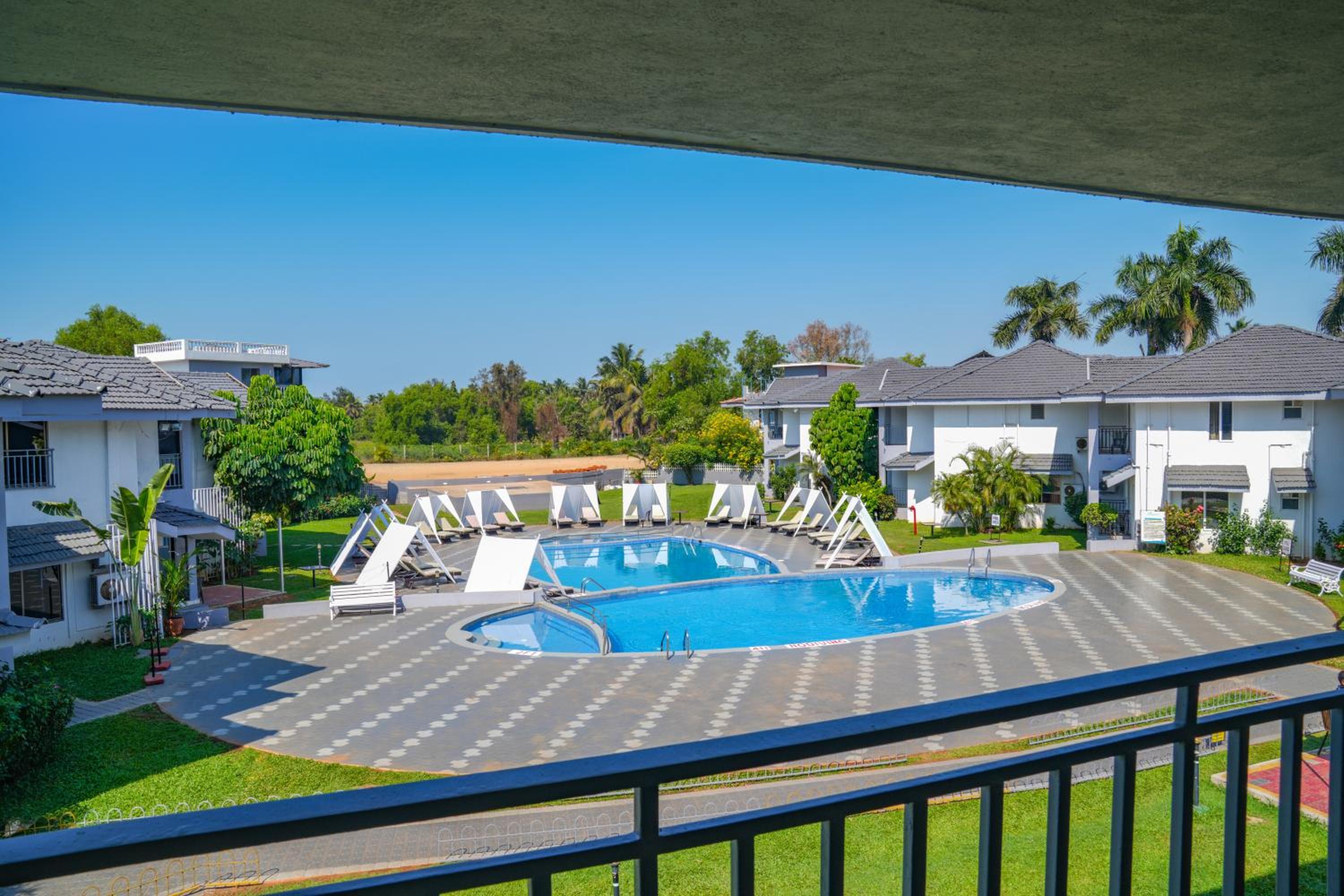 Deluxe pool view room with balcony	