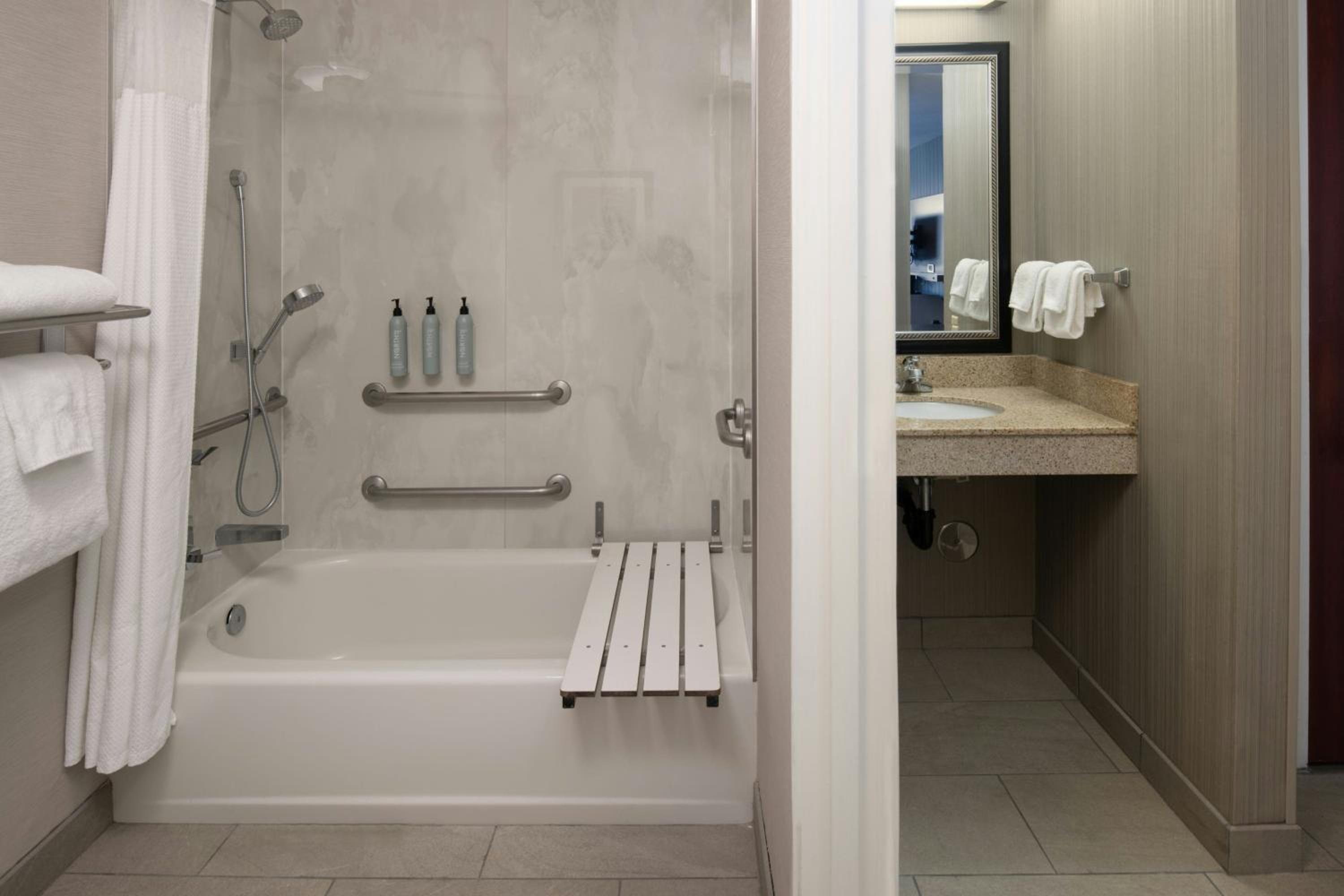 King Room with Sofa Bed and Roll-in Shower - Mobility and Hearing Accessible