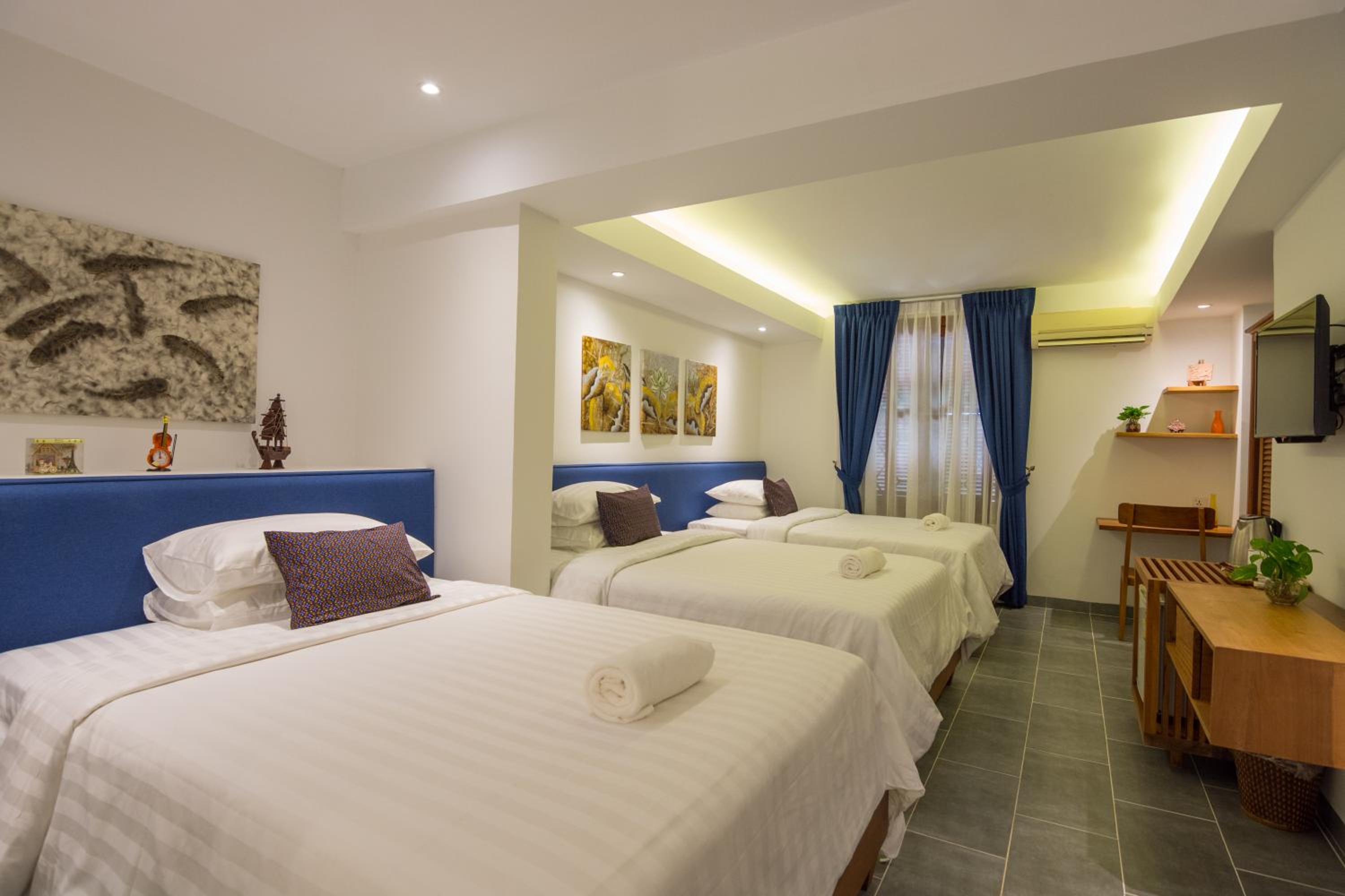 Deluxe Triple Room