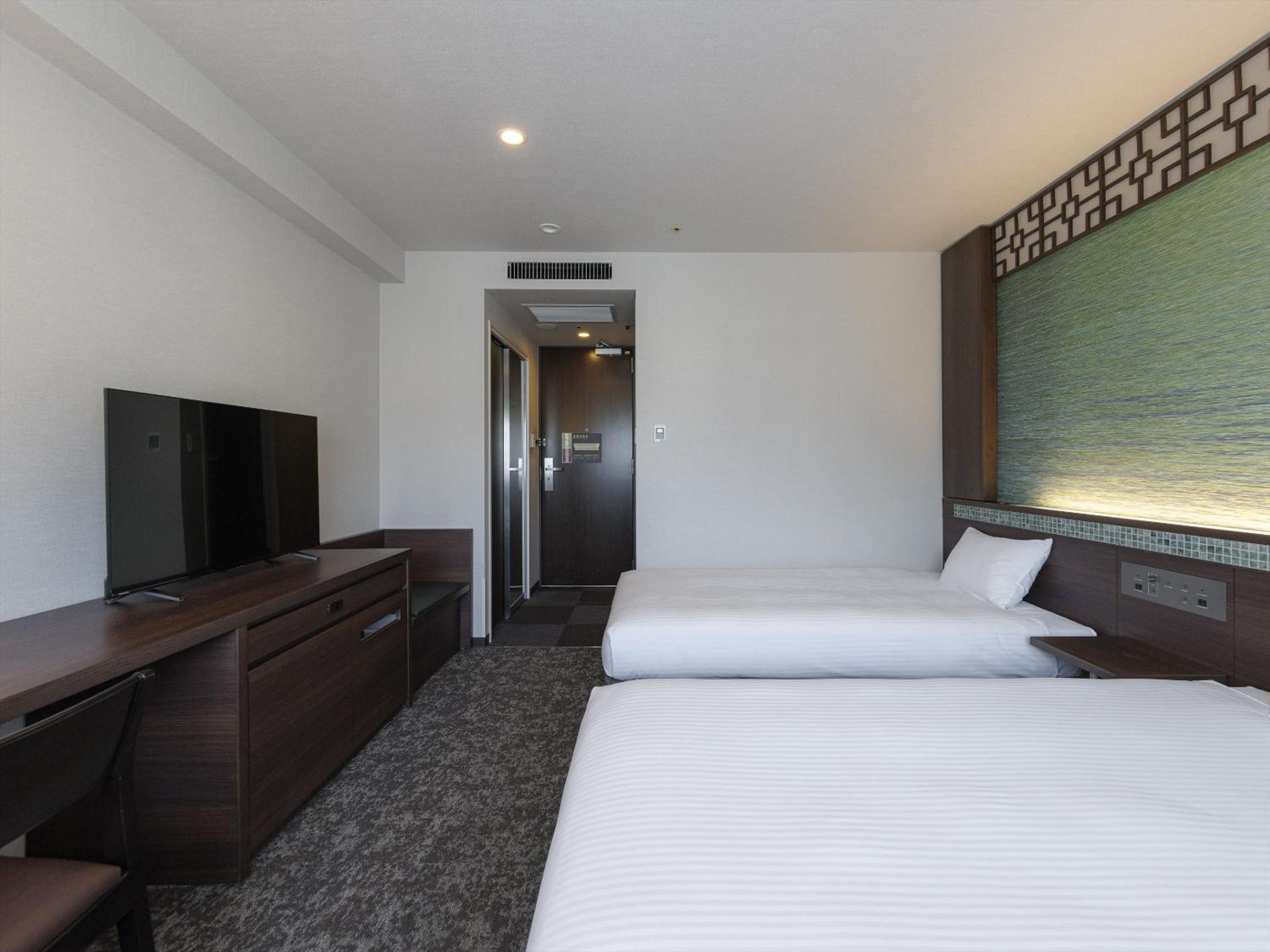 Standard Twin Room 1 Adult - Non-Smoking	