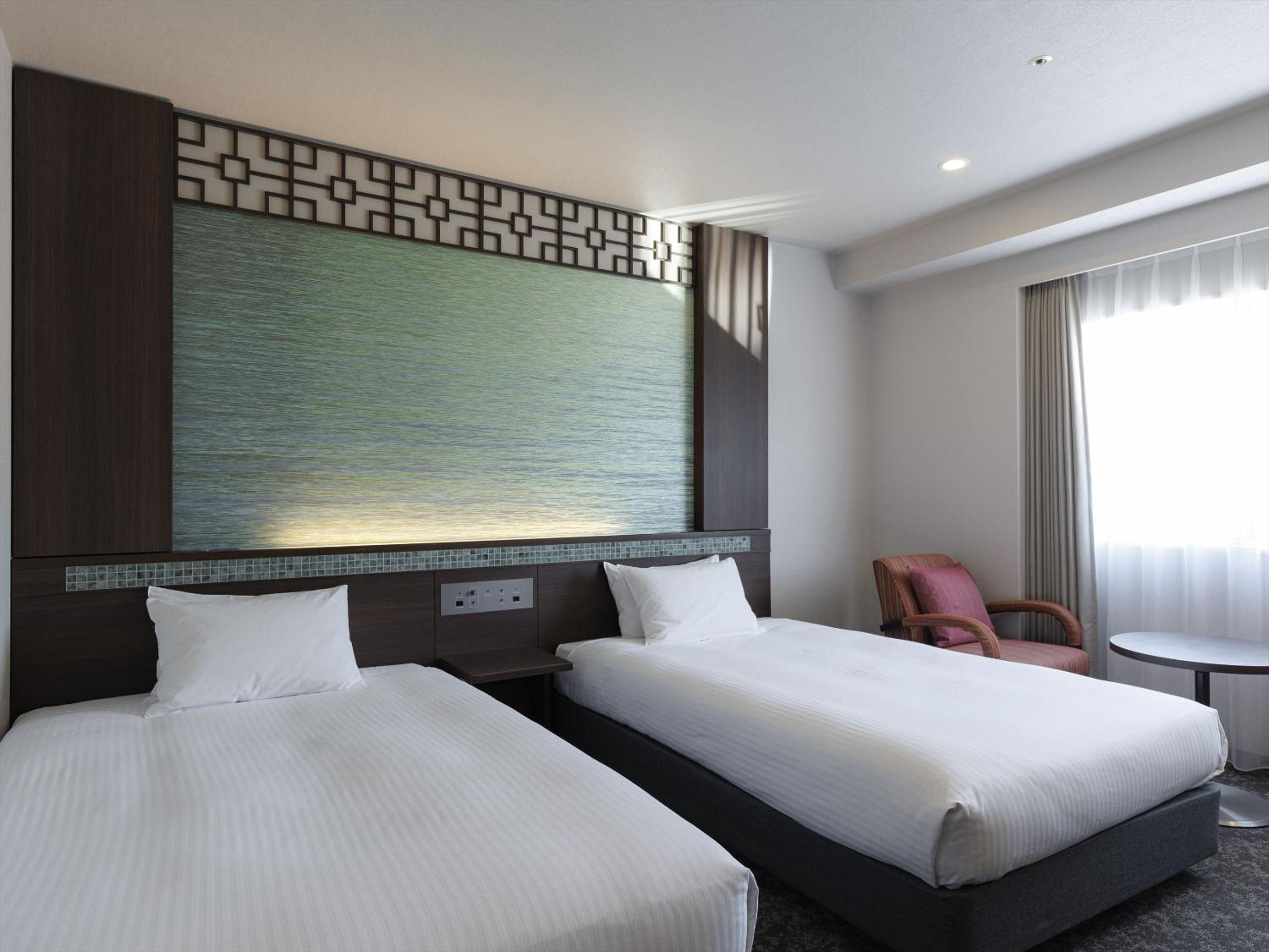 Standard Twin Room 1 Adult - Non-Smoking	