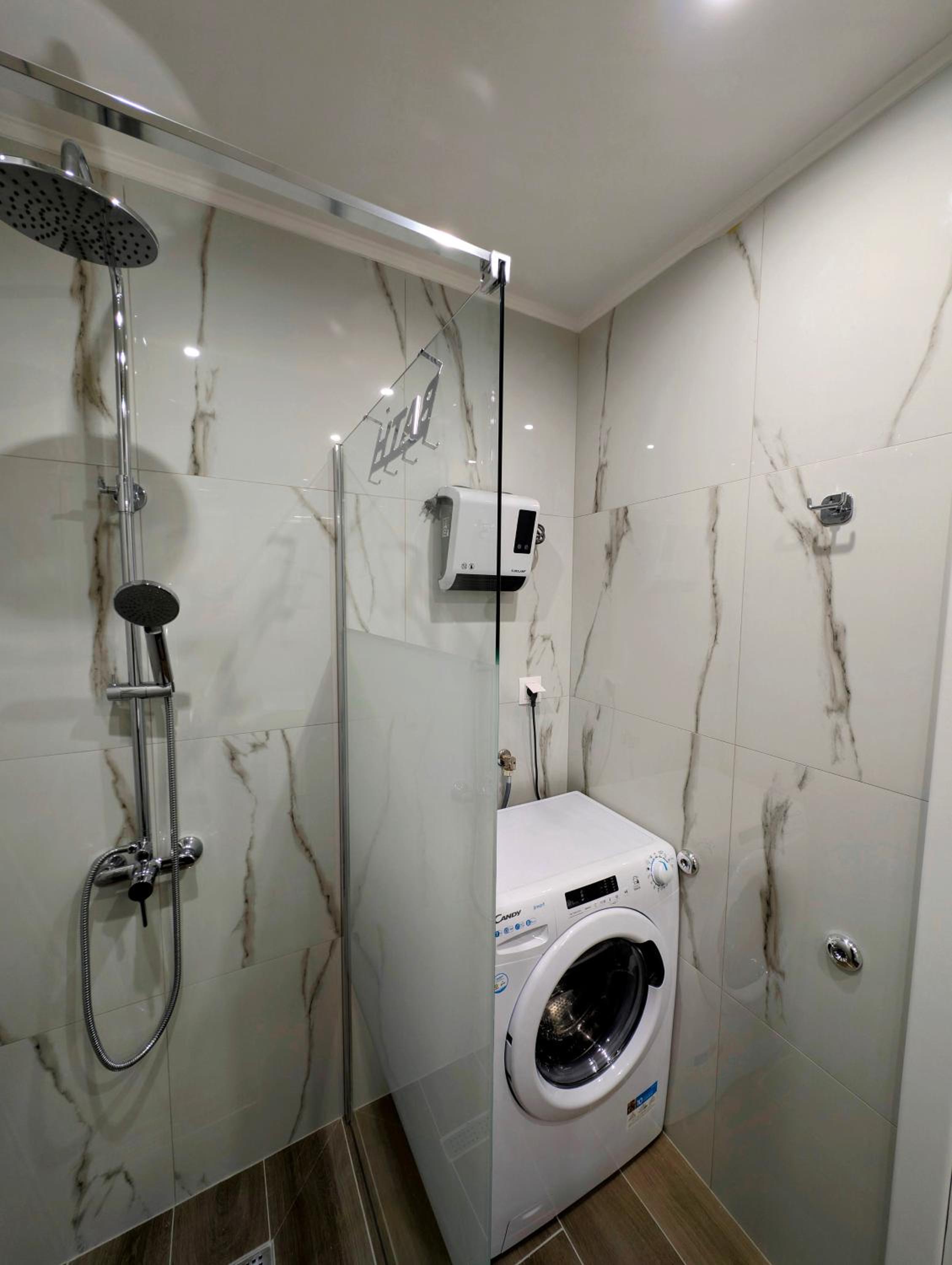 One-Bedroom Apartment with Balcony and City View