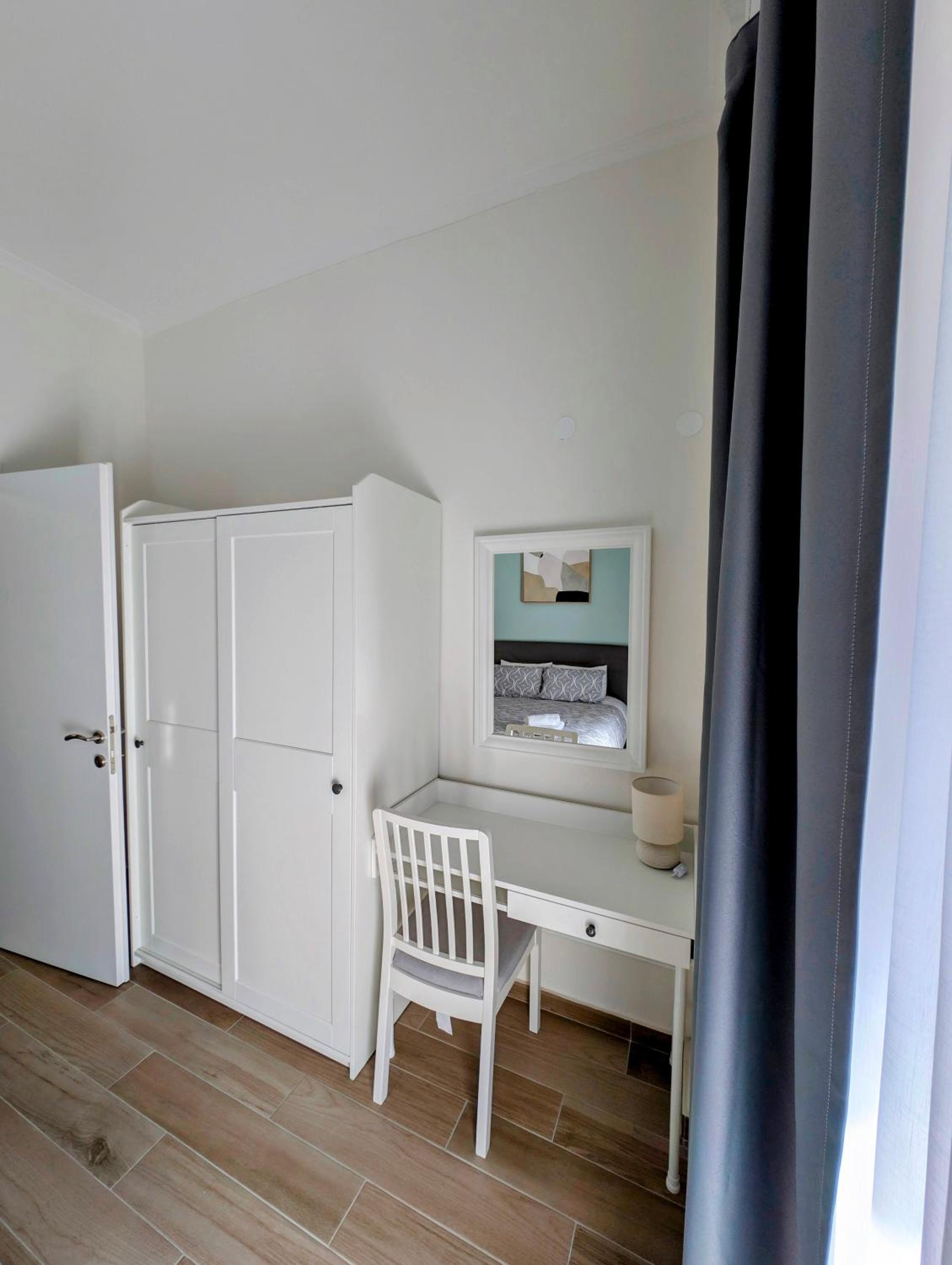 One-Bedroom Apartment with Balcony and City View