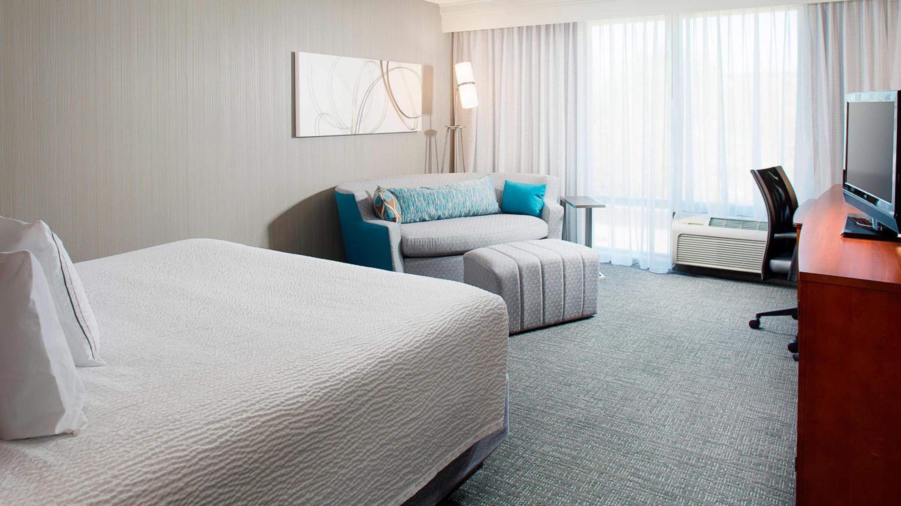 King Room with Sofa Bed and Roll-in Shower - Mobility and Hearing Accessible