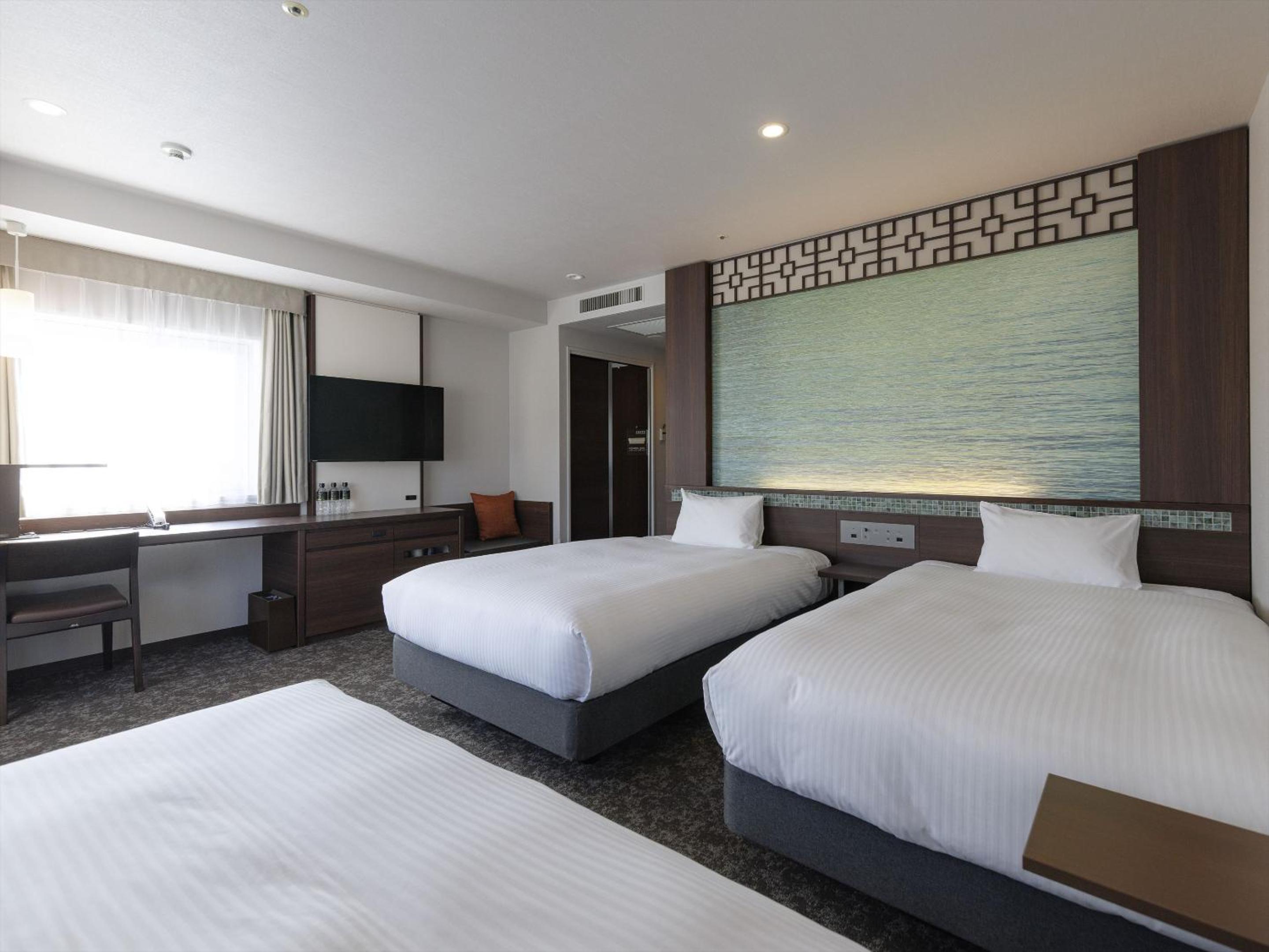 Deluxe Twin Room 3 Adult - Non-Smoking