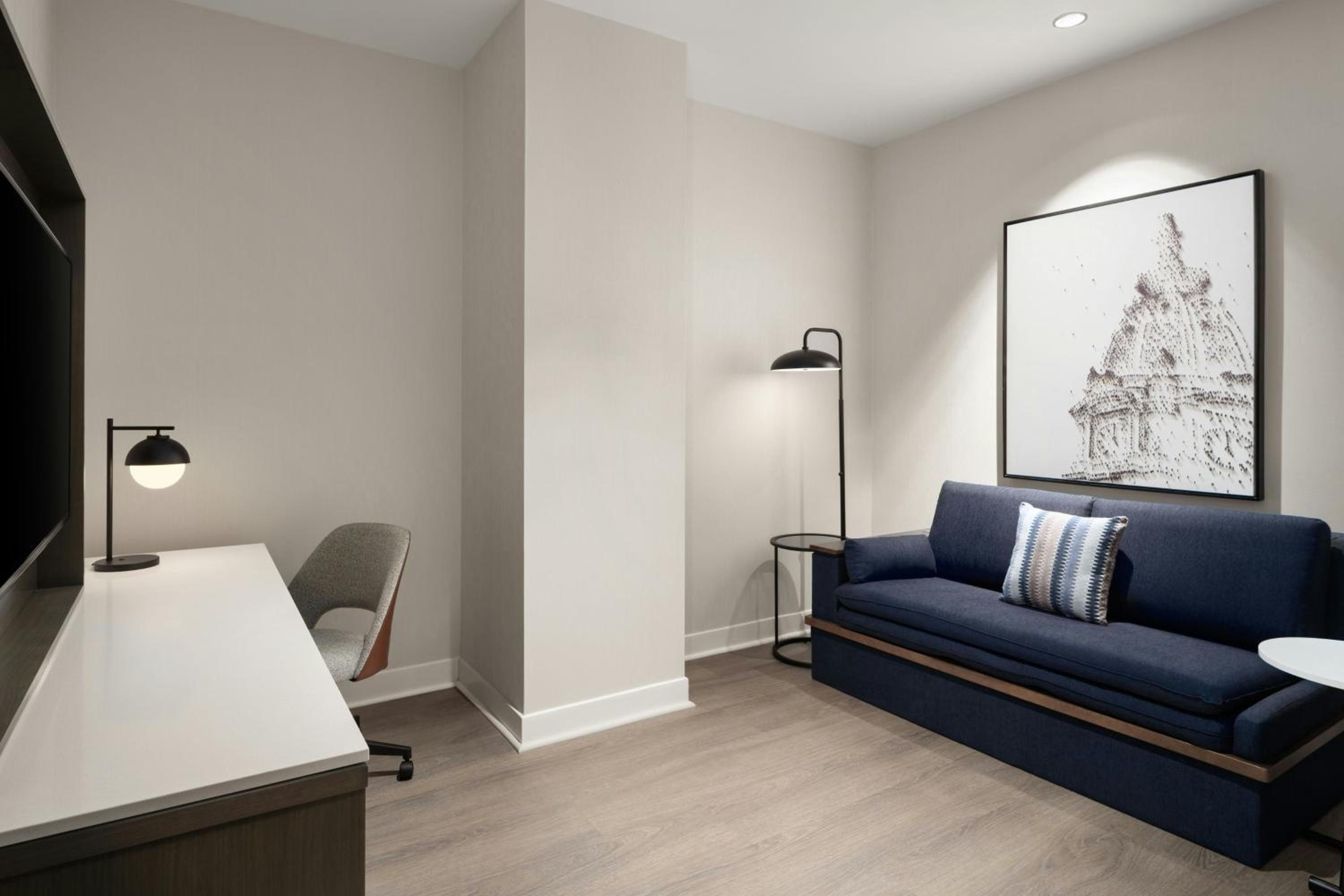 One-Bedroom King Suite with Private Sofa Bed and Atrium View