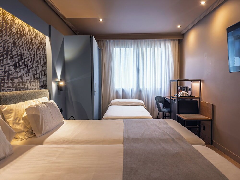 Triple Room (1 adult + 2 children)