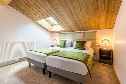 Prestige Chambre Triple в Madame Vacances Hotel Le Mottaret