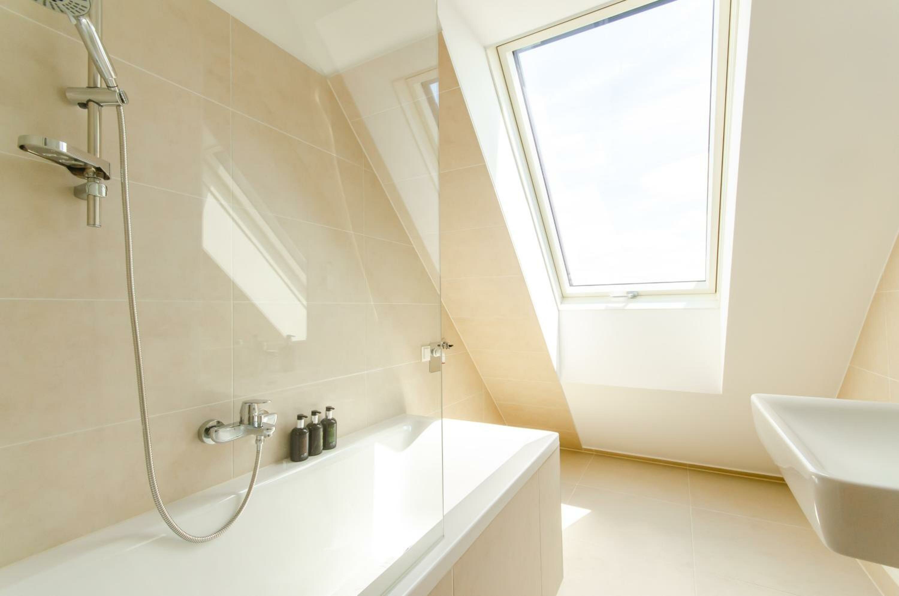 One-Bedroom Apartment with Balcony and City View