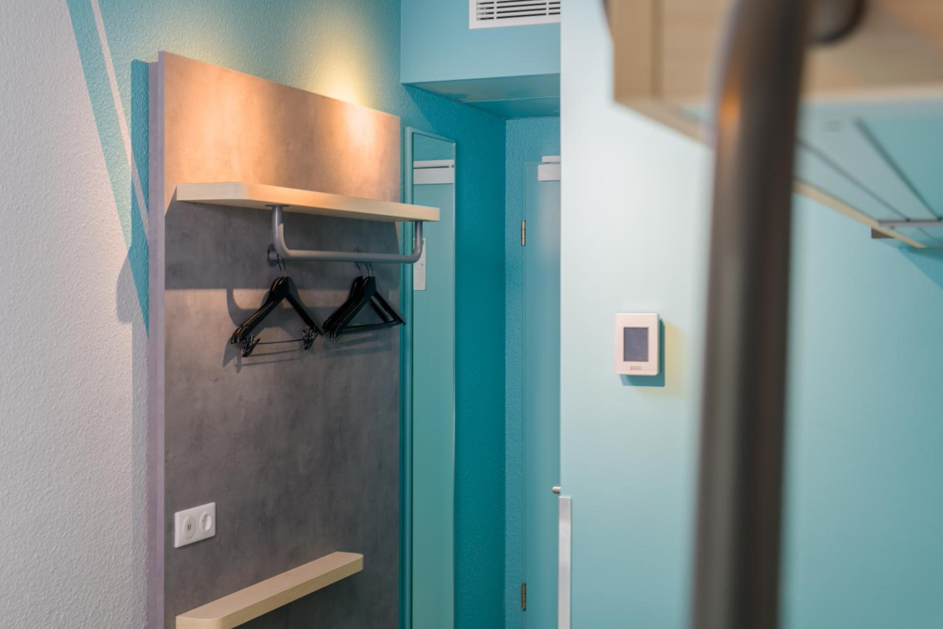 Small twin room with private bathroom and toilet