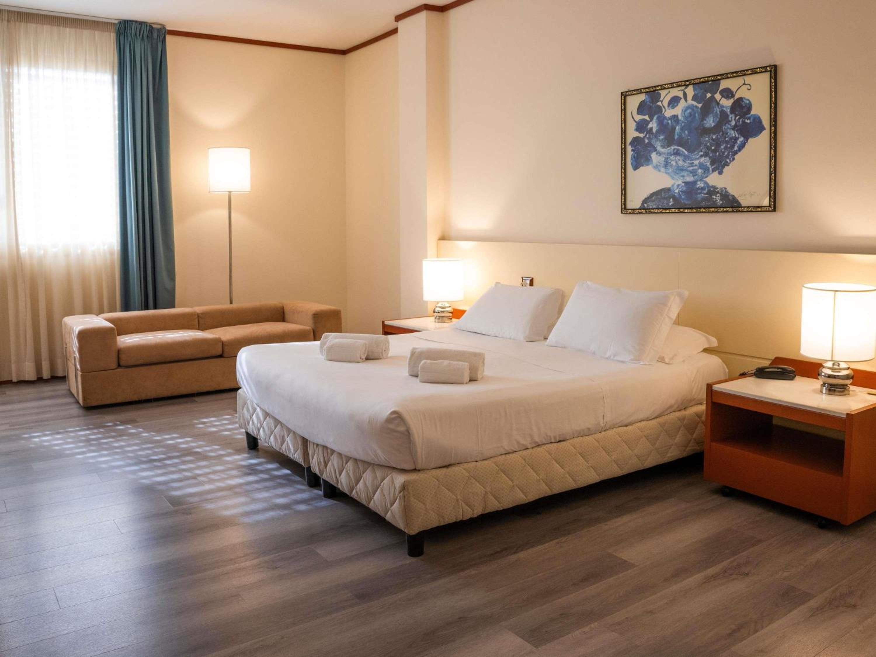 Classic Triple Room with One Queen and One Single Bed