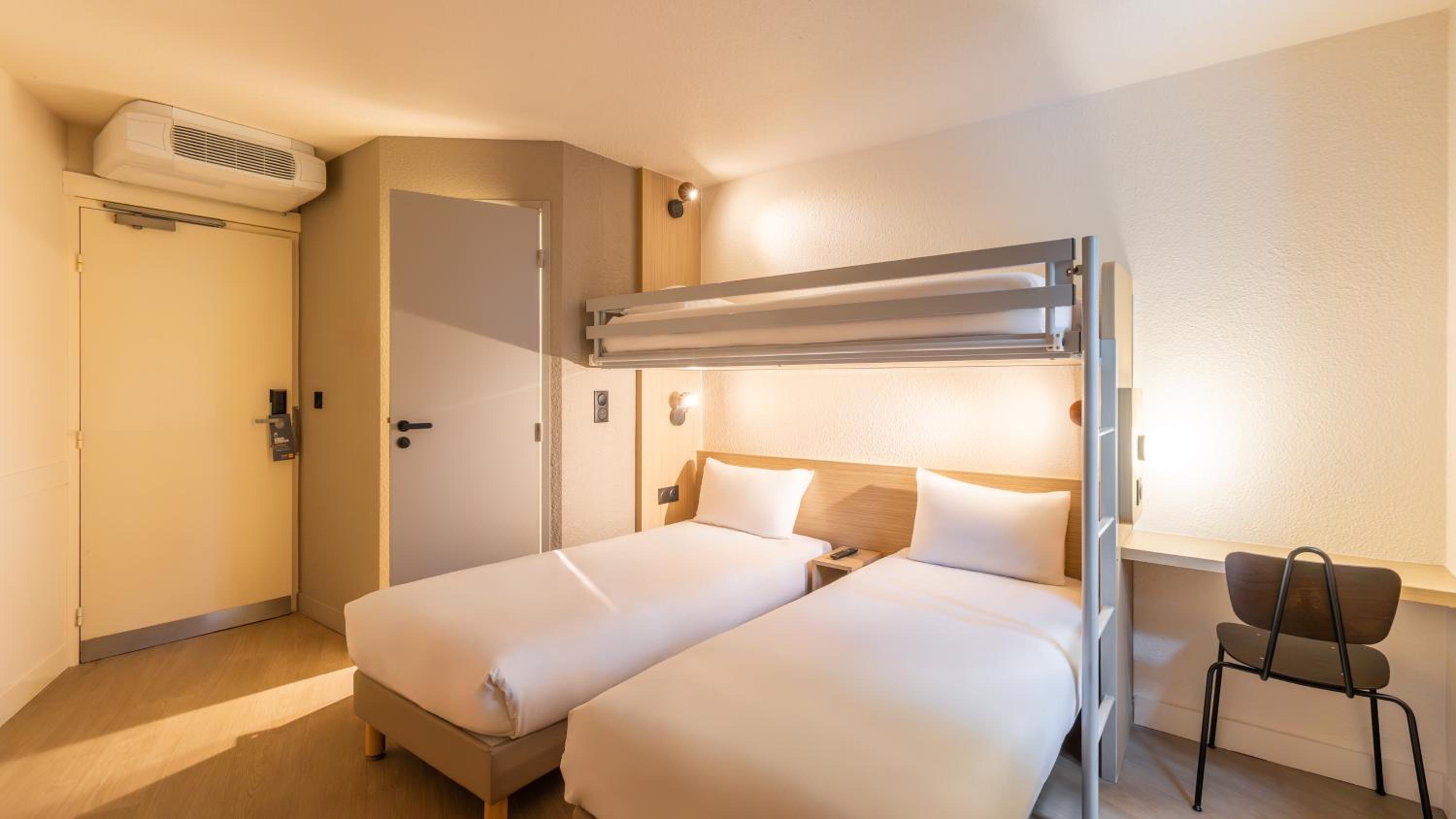 Standard Room with Two Single Beds and One Bunk Bed