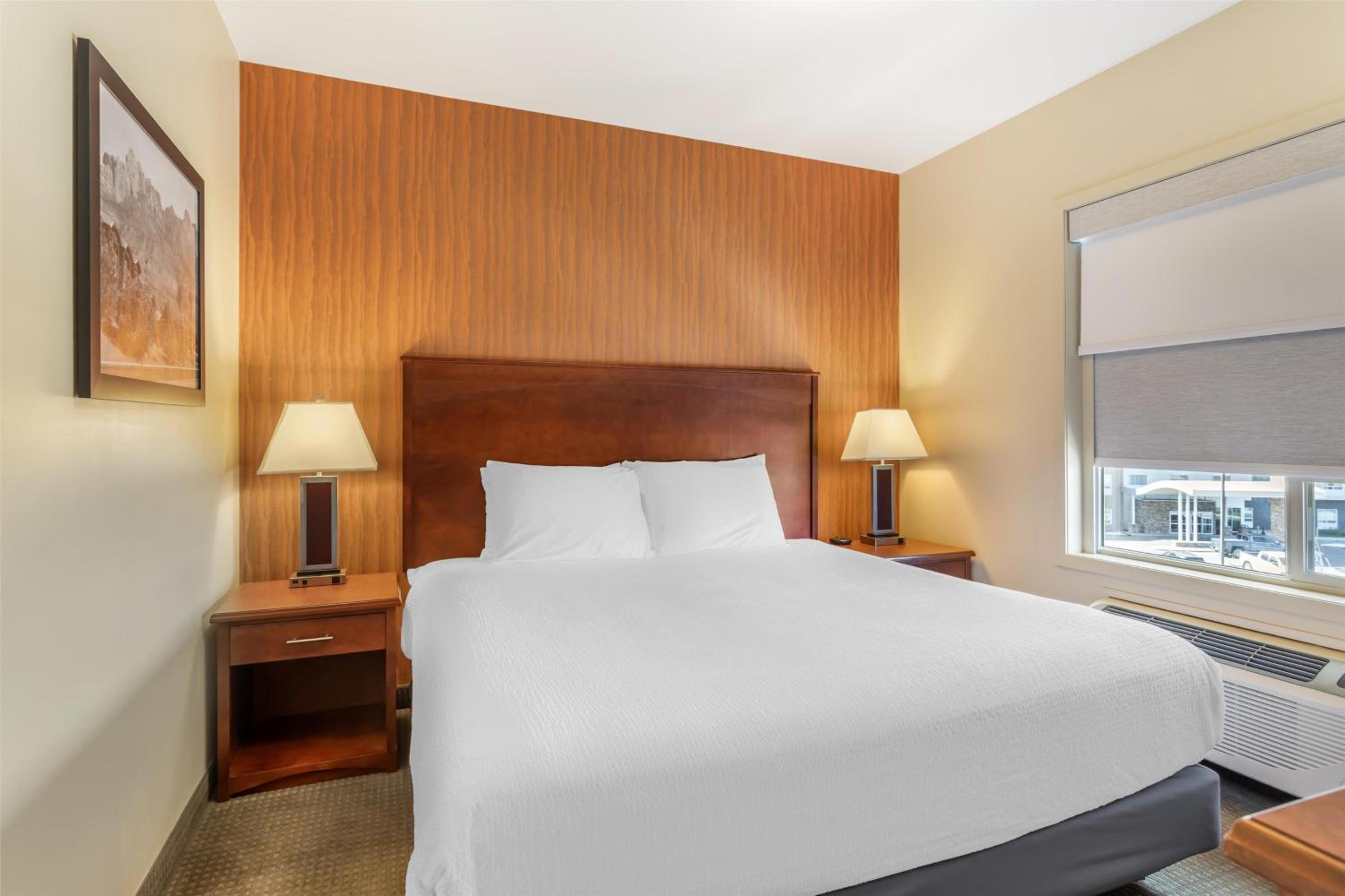 One-Bedroom Family Suite with One King, One Queen Bed and Sofa Bed - Non-Smoking