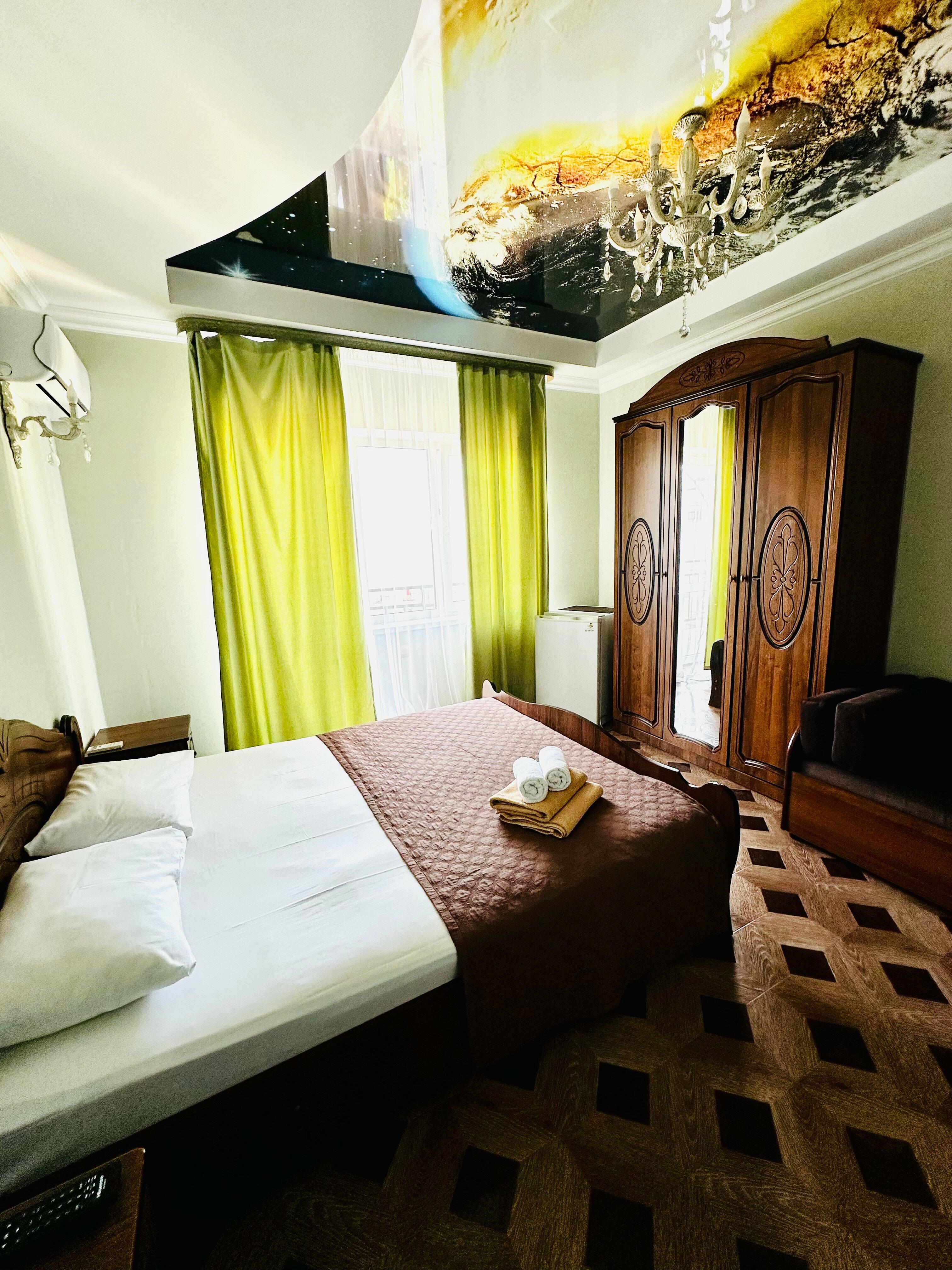 Трехместный номер с балконом