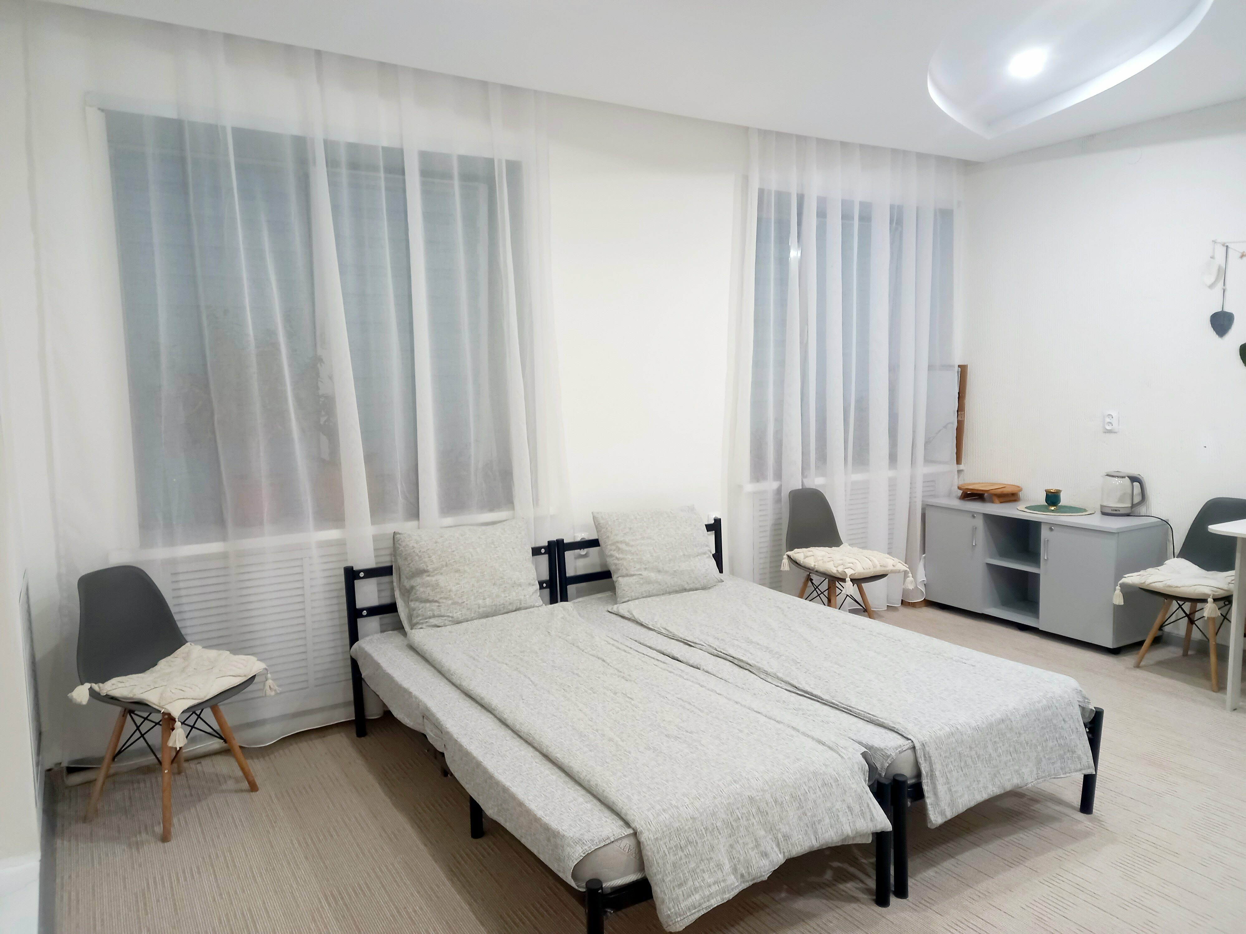 Студия вместимостью до 4 человек с односпальными кроватями