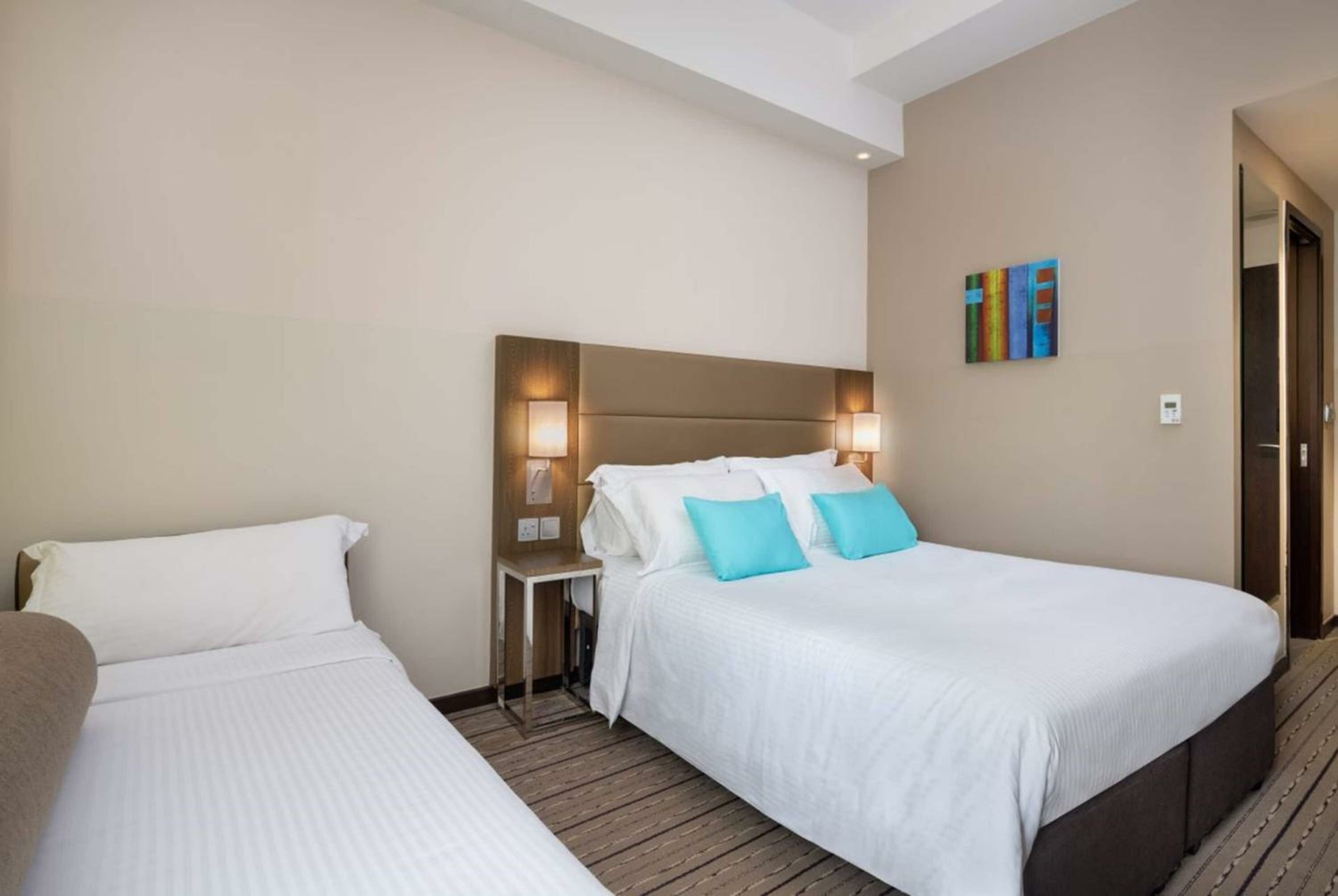 Triple Room with 1 Queen Bed & 1 Sofa Bed