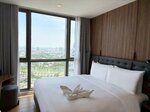 One Bedroom Deluxe Sky View King / Twin в Oakwood Suites Tiwanon Bangkok