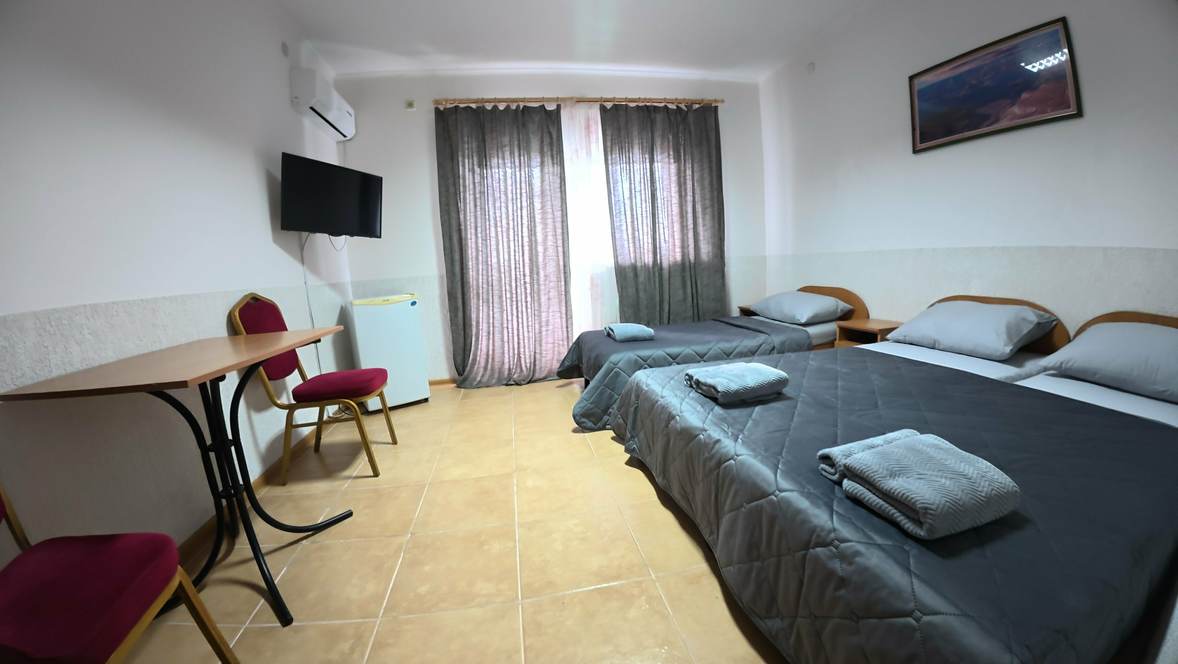 Улучшенный трехместный номер