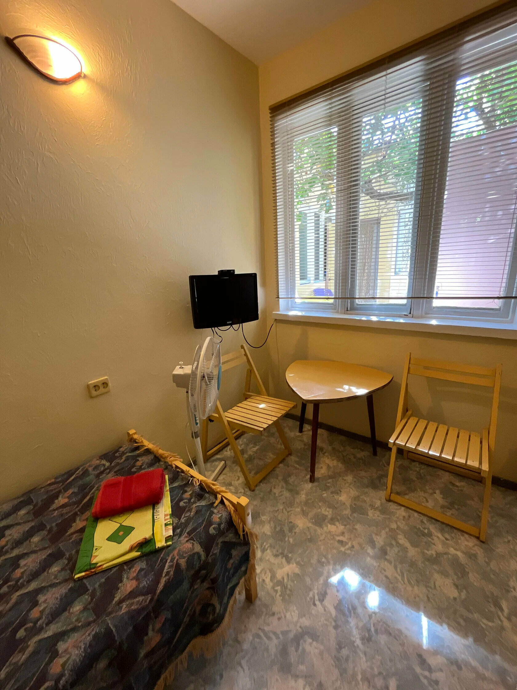 Четырехместный номер с видом на сад