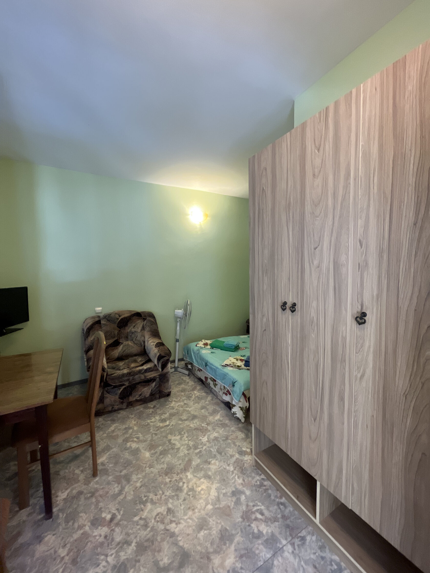 Четырехместный номер с видом на сад