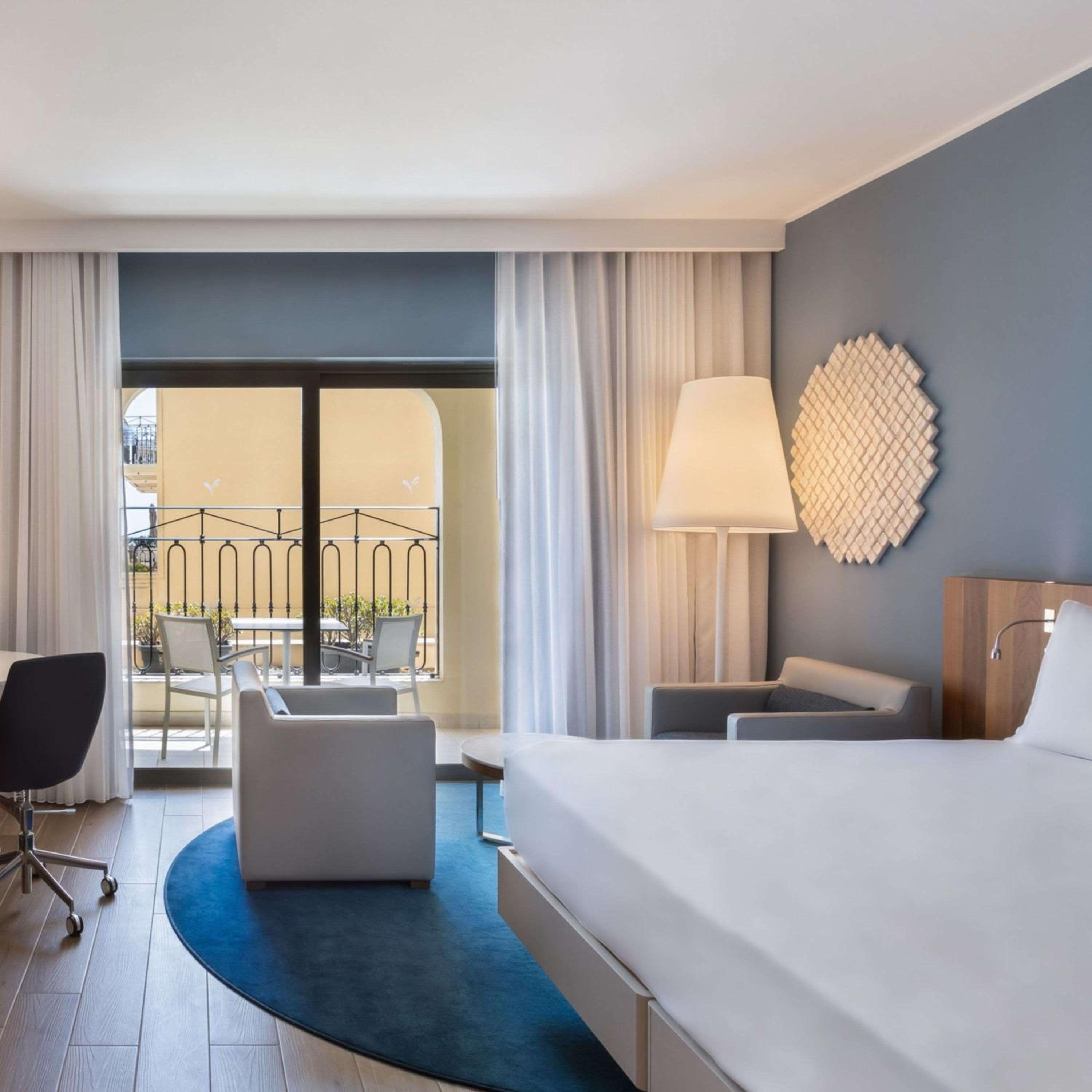 Deluxe King Room with Sofa Bed and Garden View