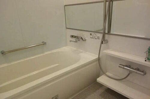 Большой номер Excellency в японско-западном стиле в башне в Atami Korakuen Hotel