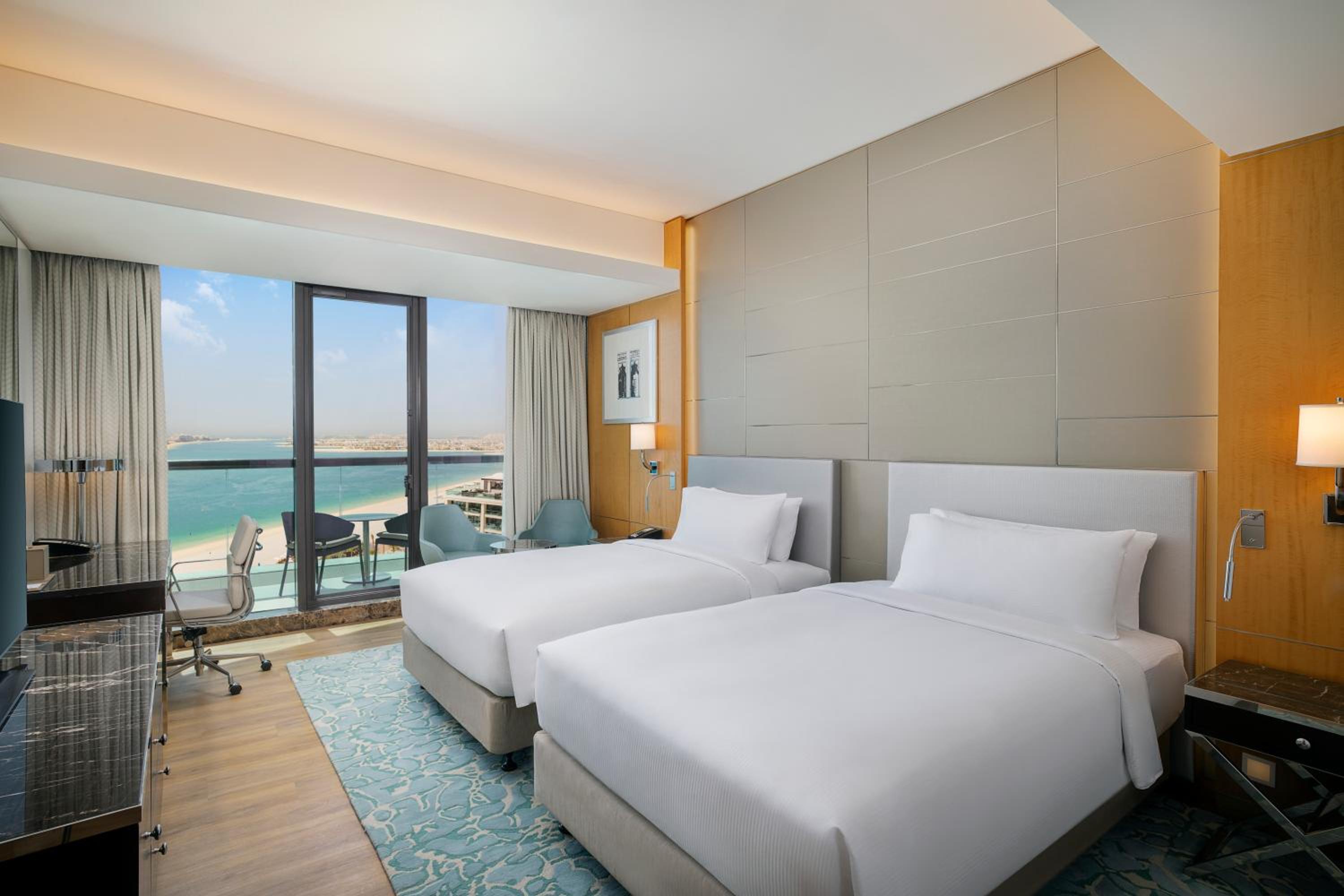 Two Double Beds Deluxe Room with Sea View and Balcony