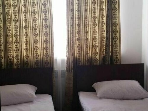 Двухместный номер эконом-класса с 2 отдельными кроватями