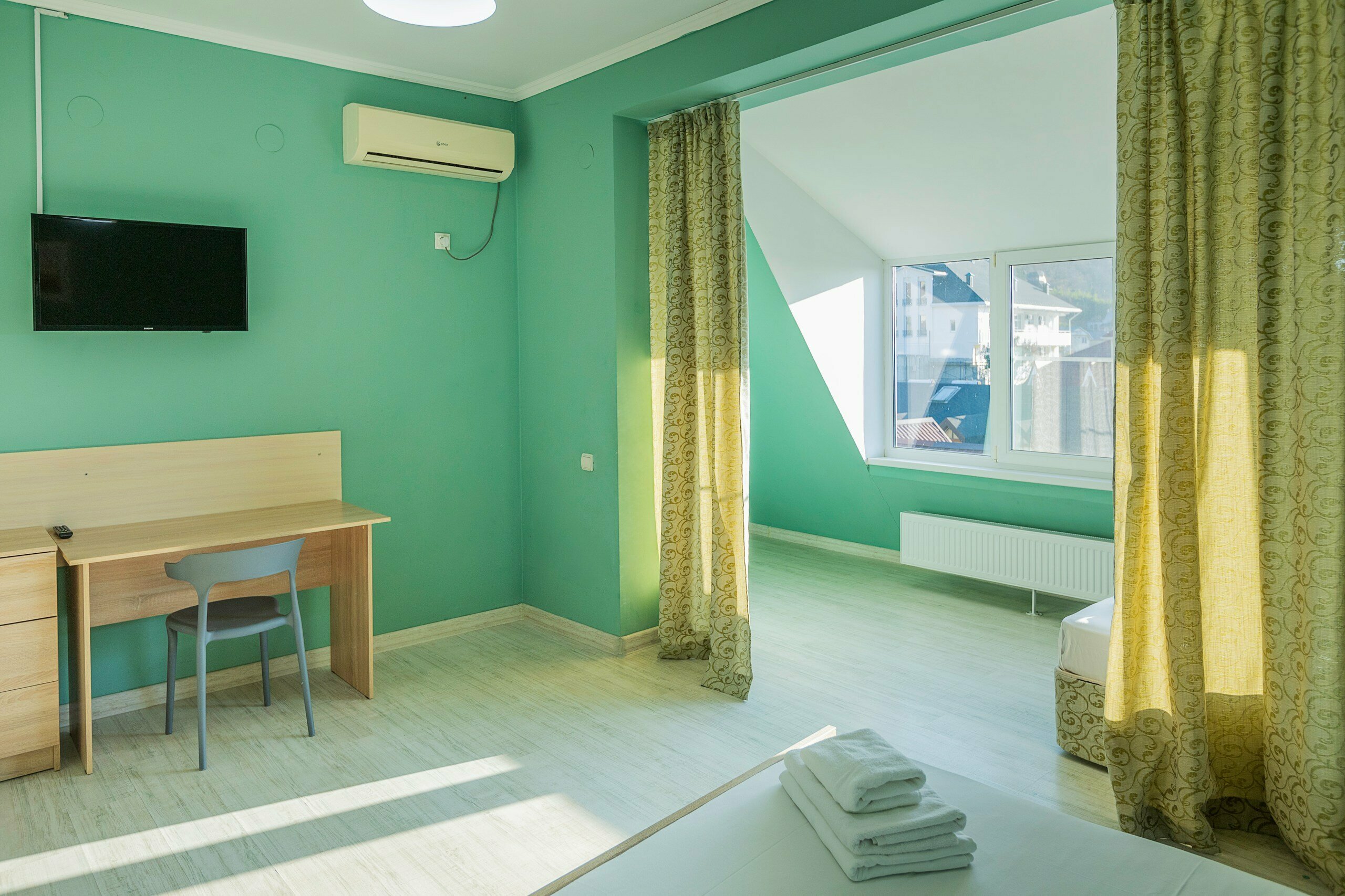 Улучшенный четырехместный номер