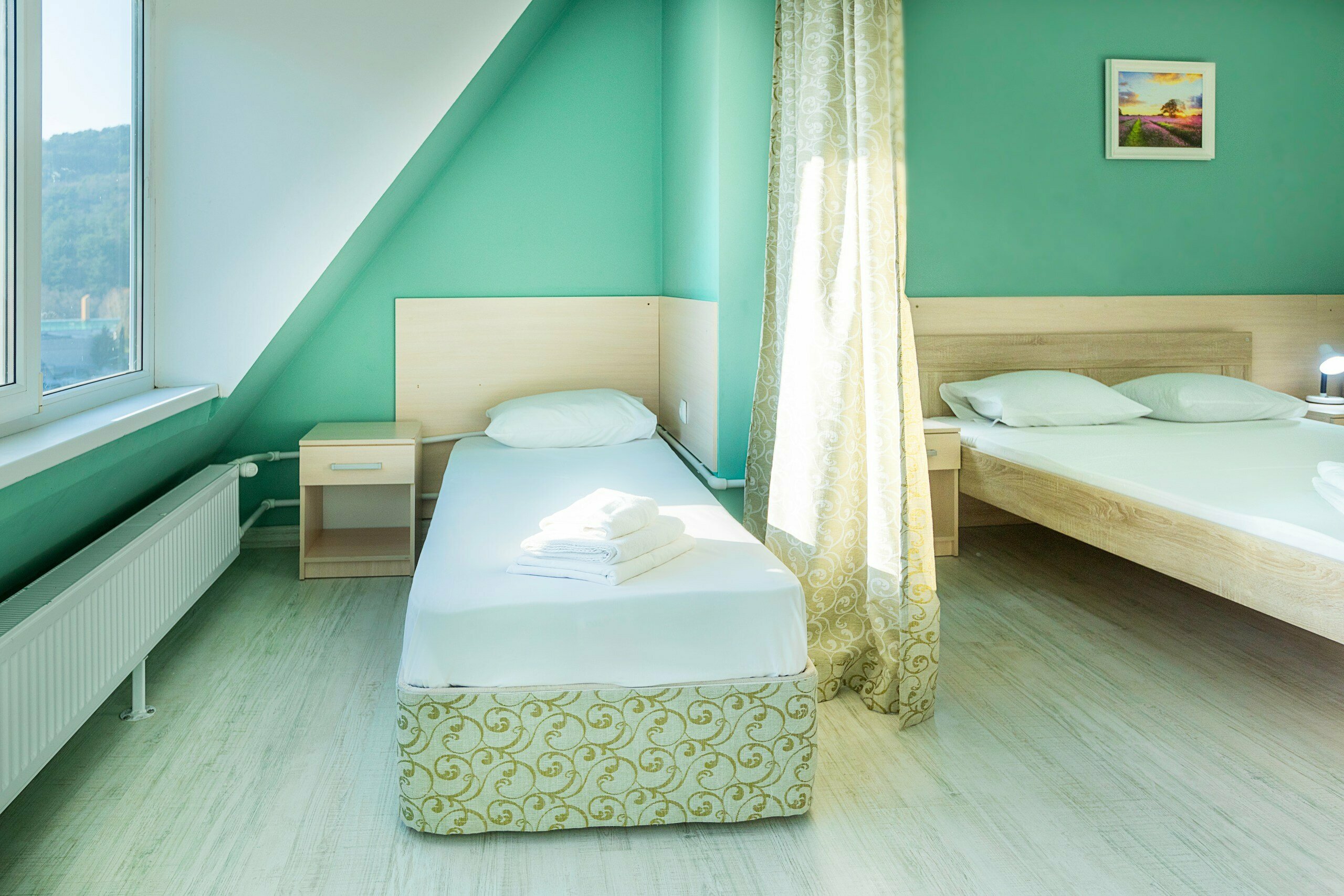 Улучшенный четырехместный номер