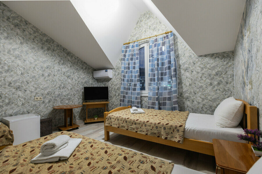 Улучшенный четырехместный номер