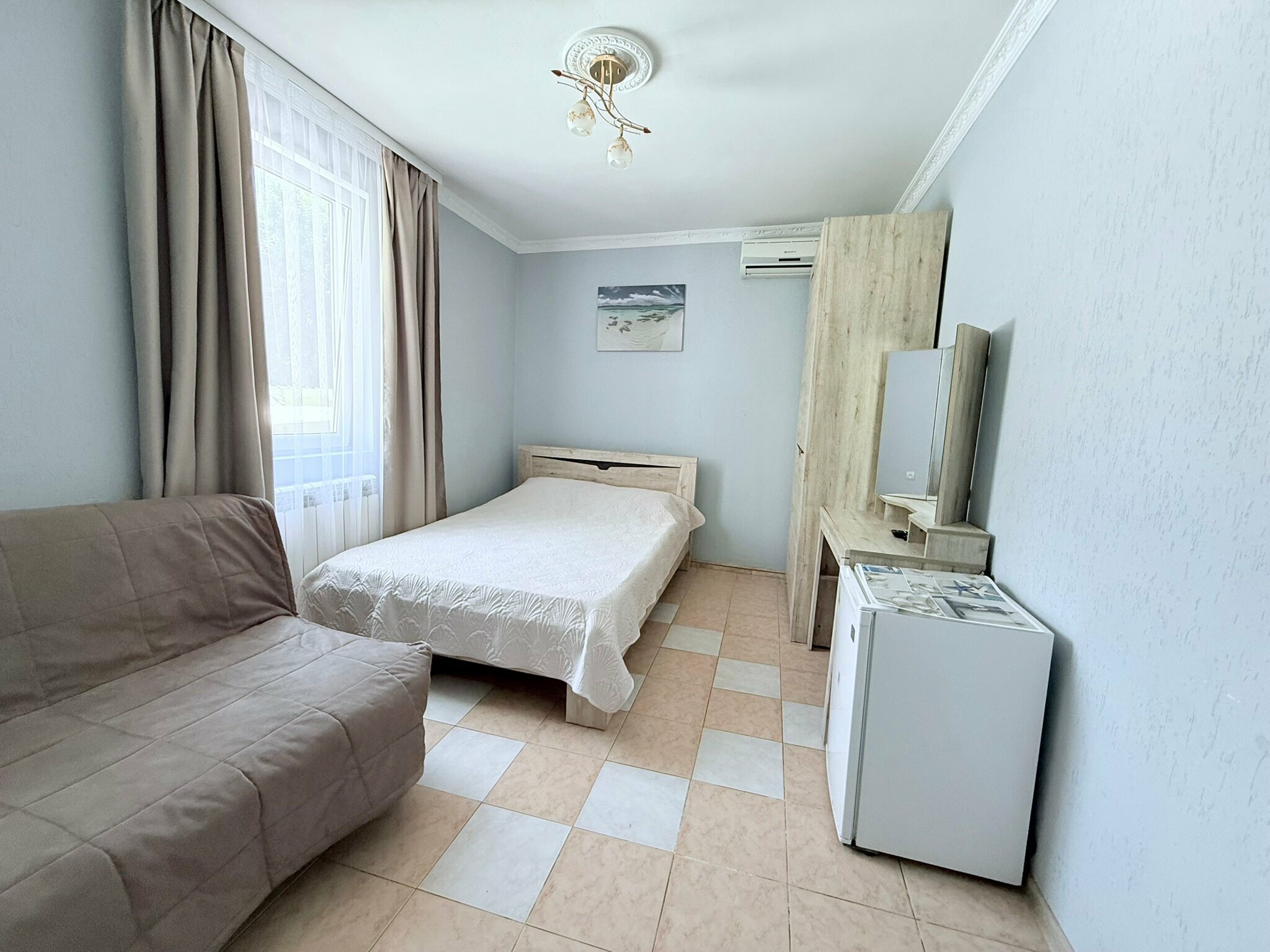 Улучшенный четырехместный номер