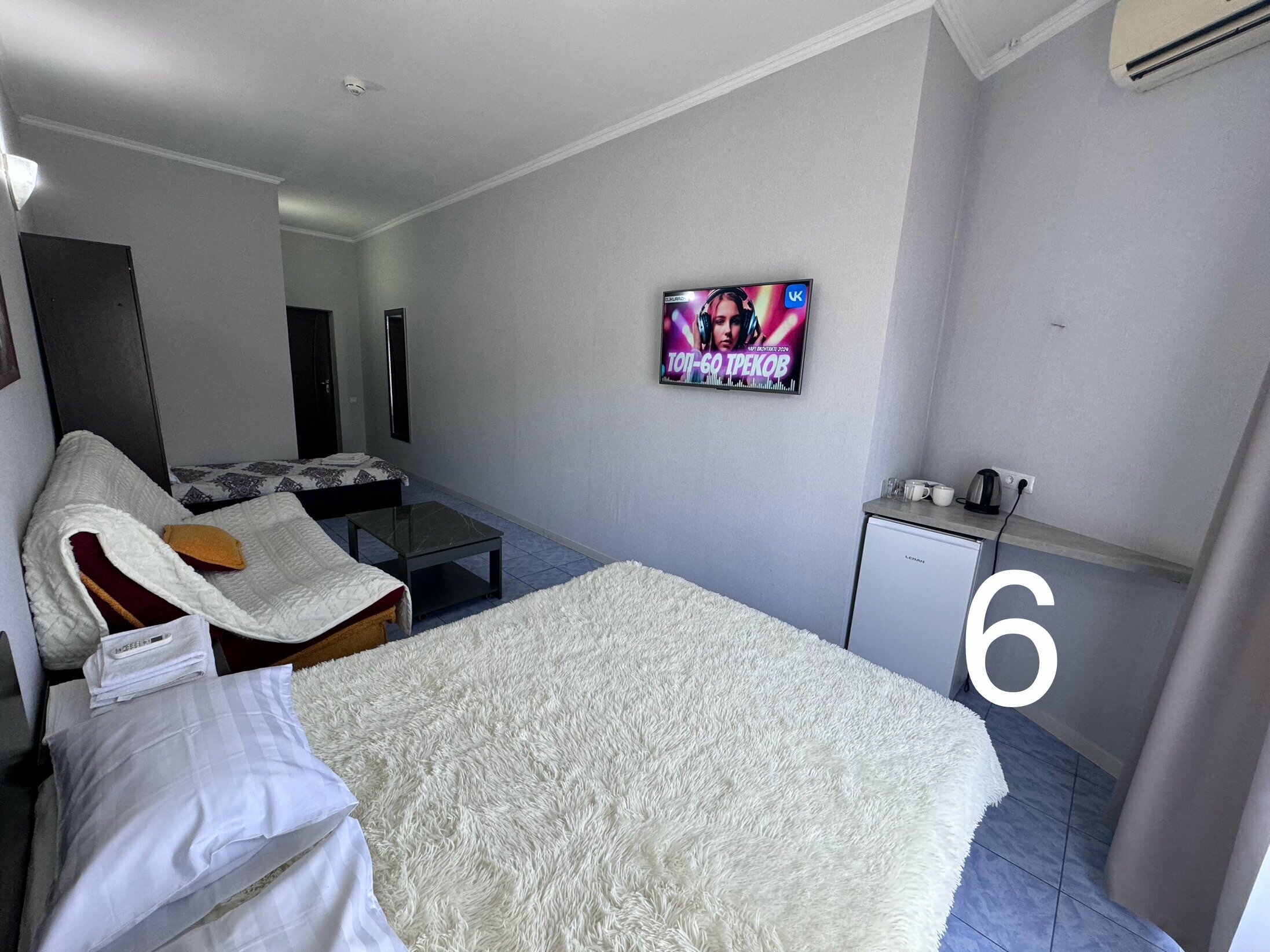 Четырехместный номер с балконом